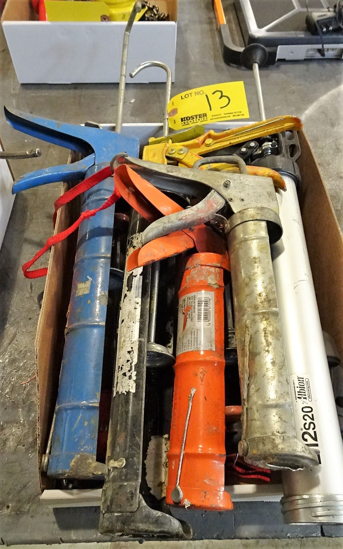 LOT OF VARIOUS SIZED CAULK GUNS