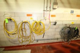 Assorted Air Hoses and Wall Mounted Holders