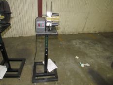 Label Feeder on casgter with manual (2013) (Rigging and loading fees included in the selling Price -