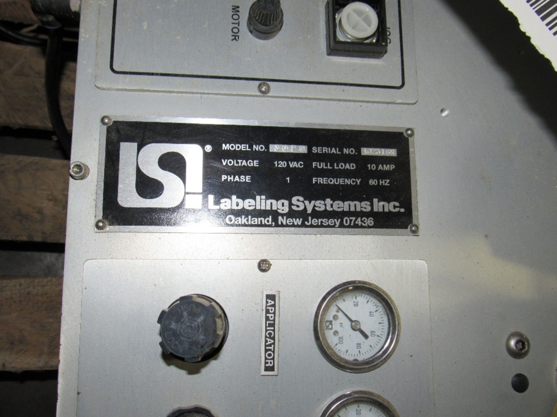 LSI Label Applicator with build in vacuum pump Model 96T0 Serial No. 1023162 designed to apply pre-