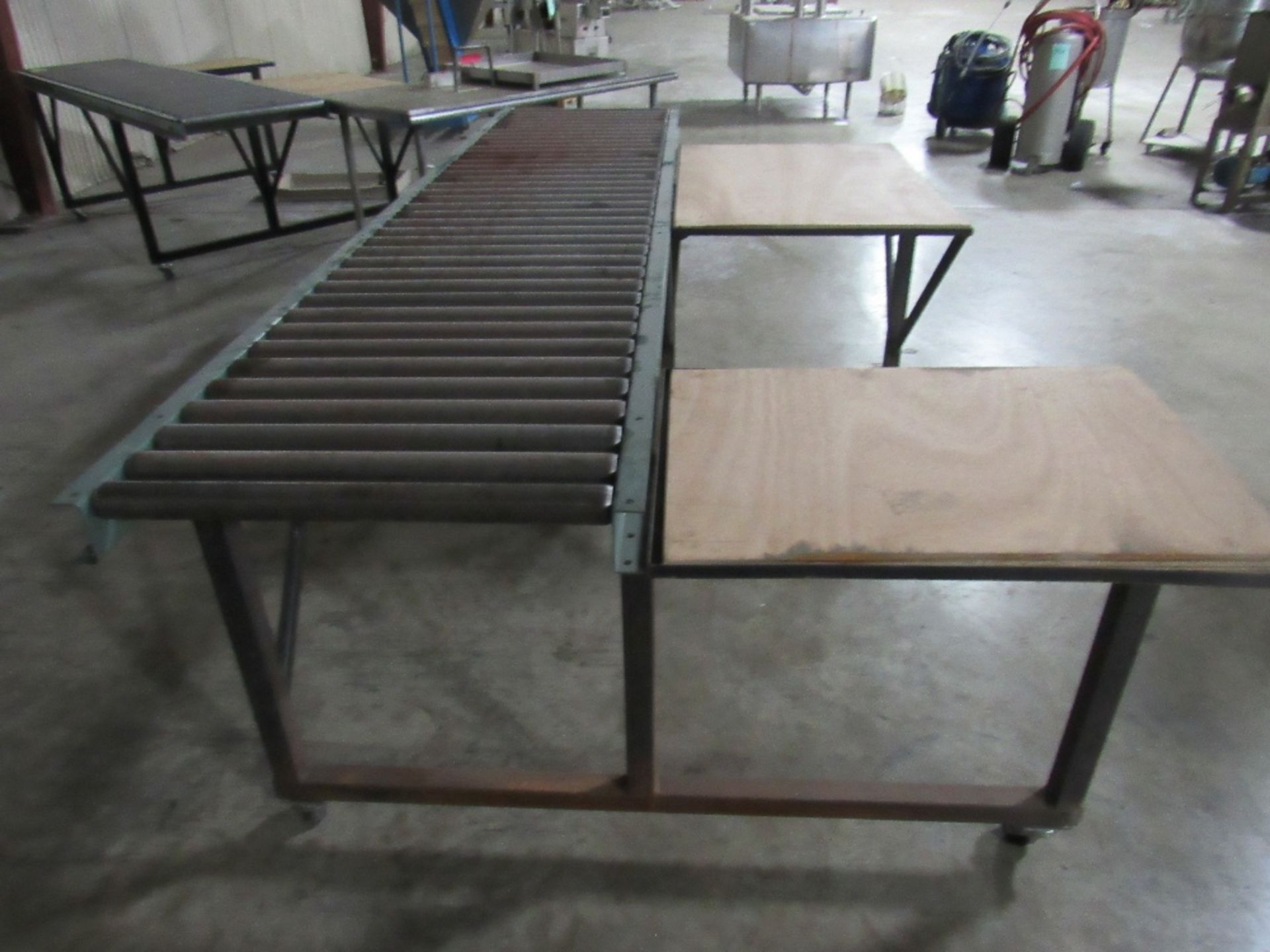 Packing Table with 10ft Hydrol Roller conveyor and two work surface with plywood tops on casters, - Image 12 of 12