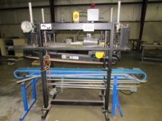 Lid Closer by Packaging Automation Corp. Packing System --Span-Tech Motorized Conveyor on bottom and