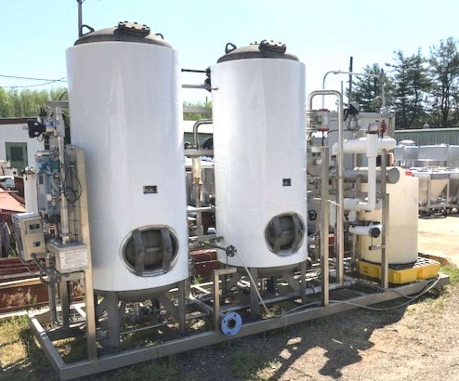 Used UltraPure Water Treatment Skid for sale. The treatment vessels are stainless steel 100 PSI