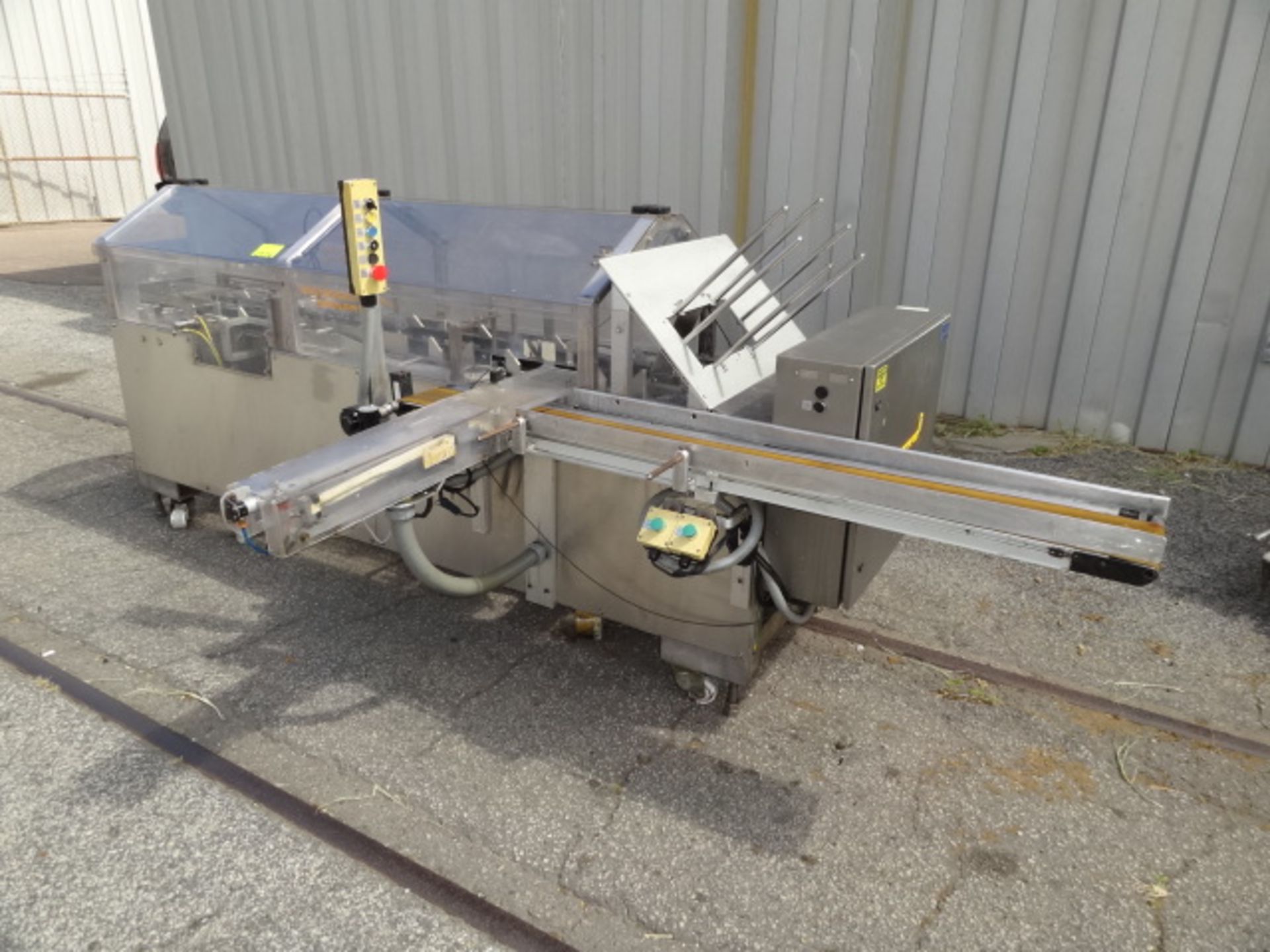 Econocorp Spartan Horizontal Cartoner, Model # n/a, S/N n/a, automatic cartoner with self-locking