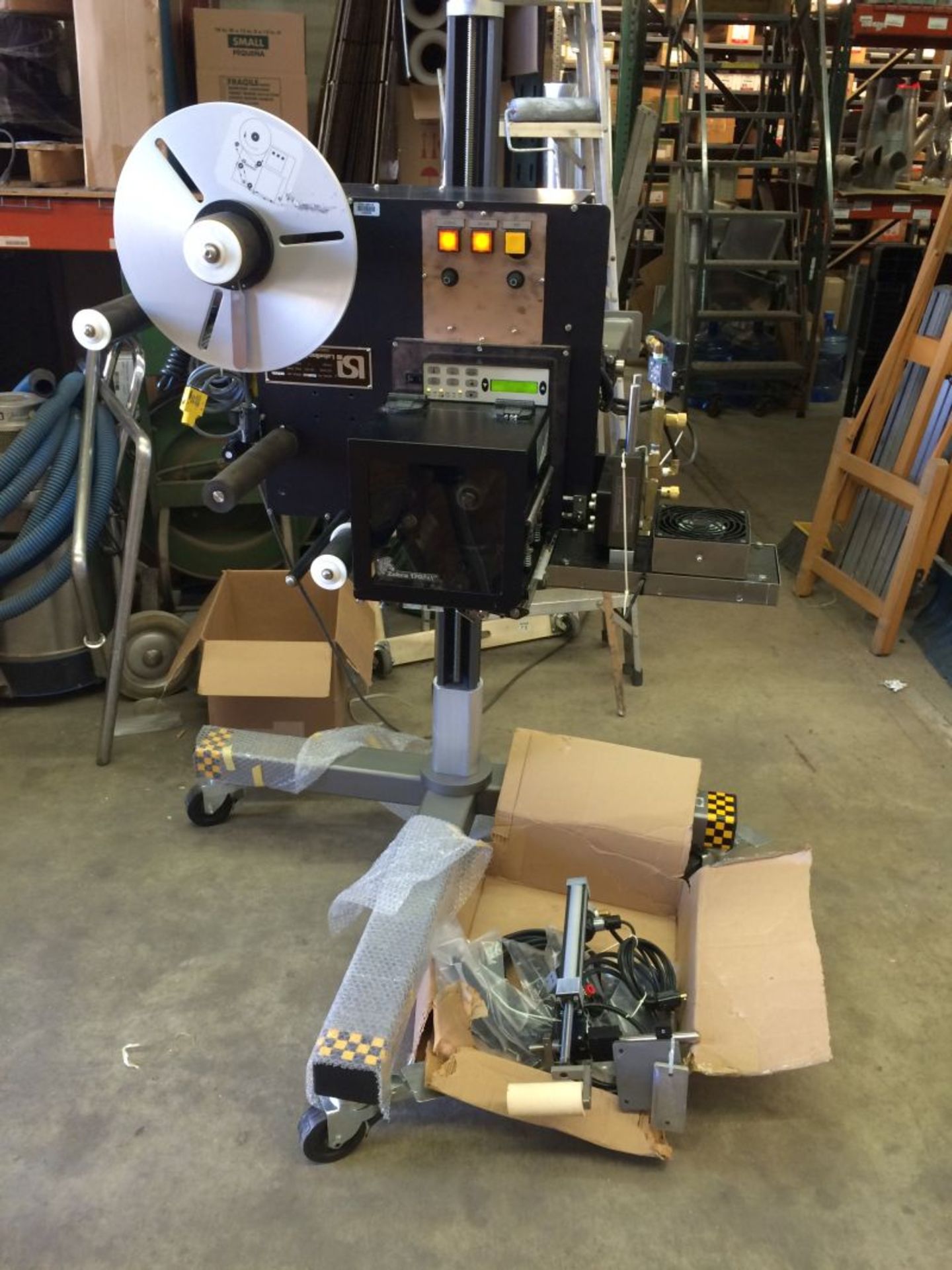 LSI Labeler - M# 2188, S# 180607R, comes on stand. As shown in photos. (Located in New York)***