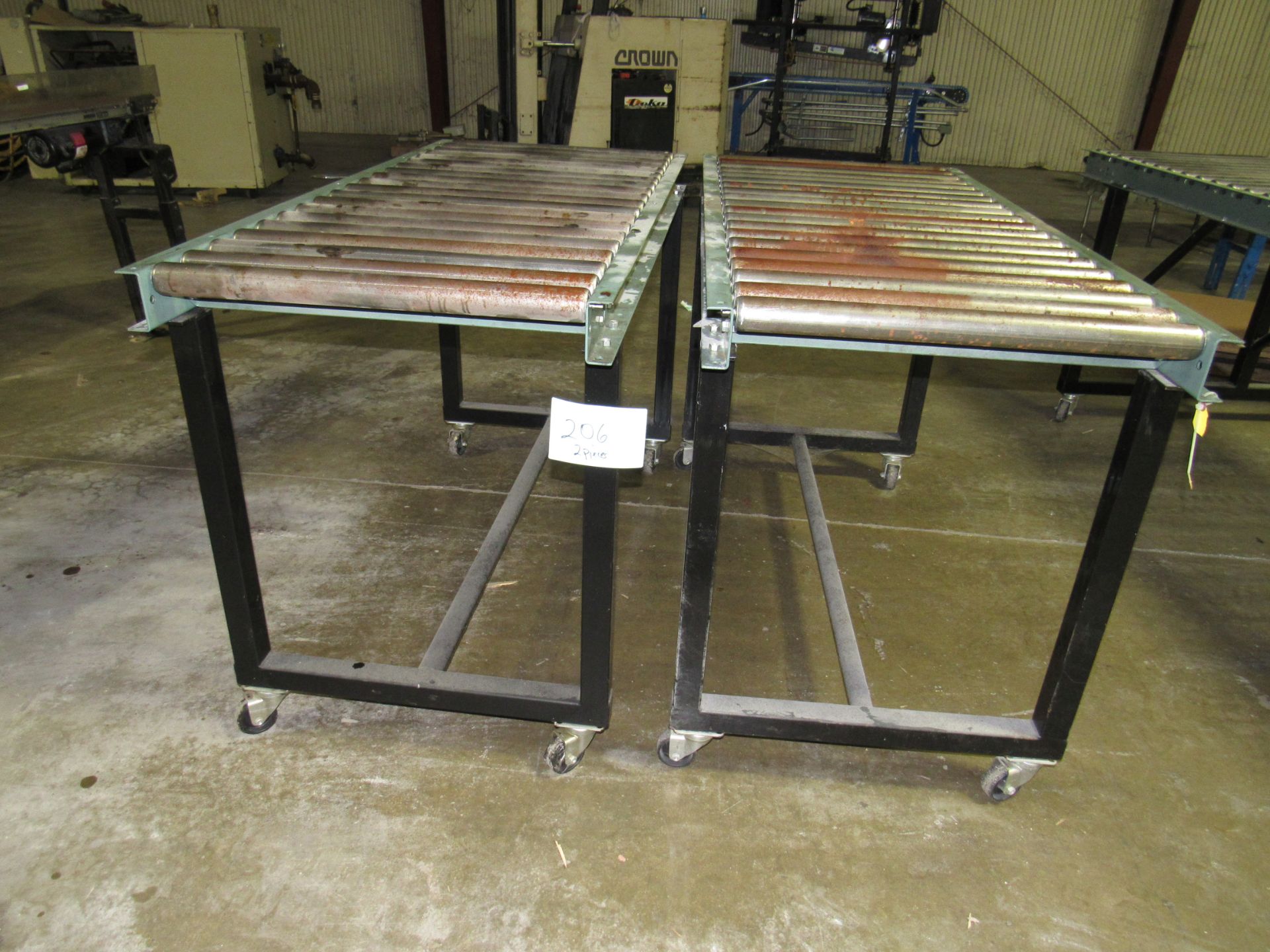 One Lot Two Hytrol Roller Conveyors on Casters -- (LOCATED IN IOWA, RIGGING INCLUDED WITH SALE