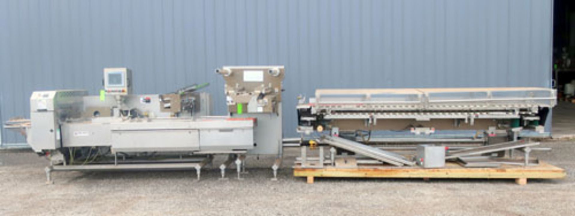 Campbell Wrapper Corp. Horizontal Flow Wrapper, Model: Revolution. Unit has a 2-up seal head,