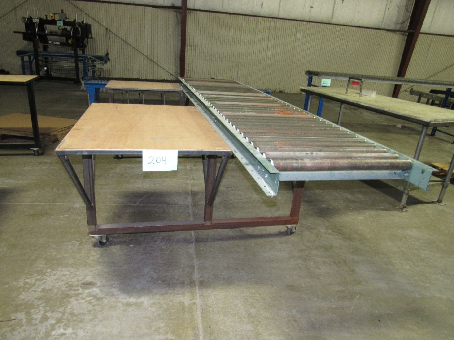 Little used Packing Conveyor with Hytrol Roller conveyor - two work surfaces - square tube base on