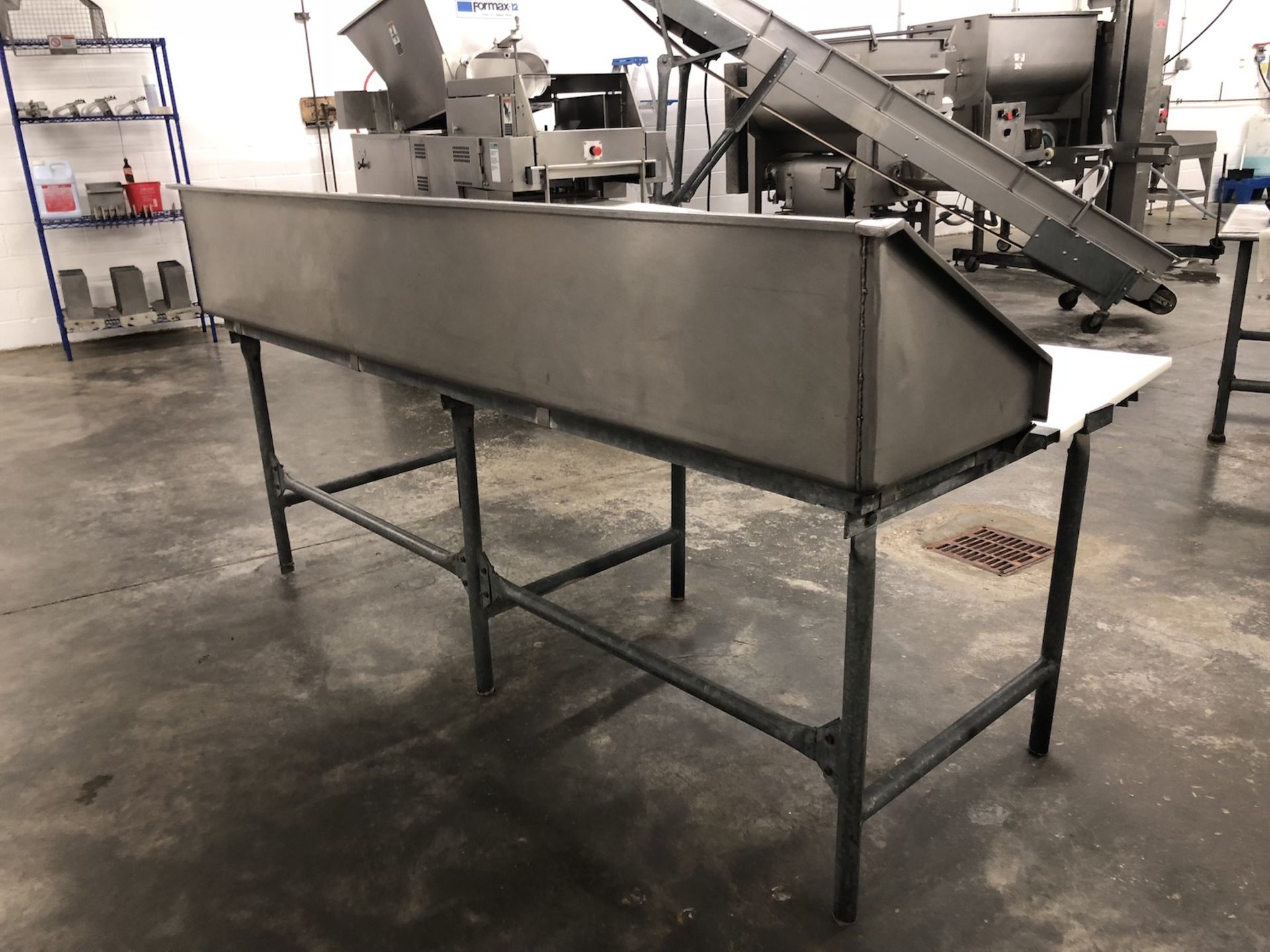 S/S Butcher table with stainless steel back panel and plastic butcher blocks approximately 8’ Long - Image 2 of 2