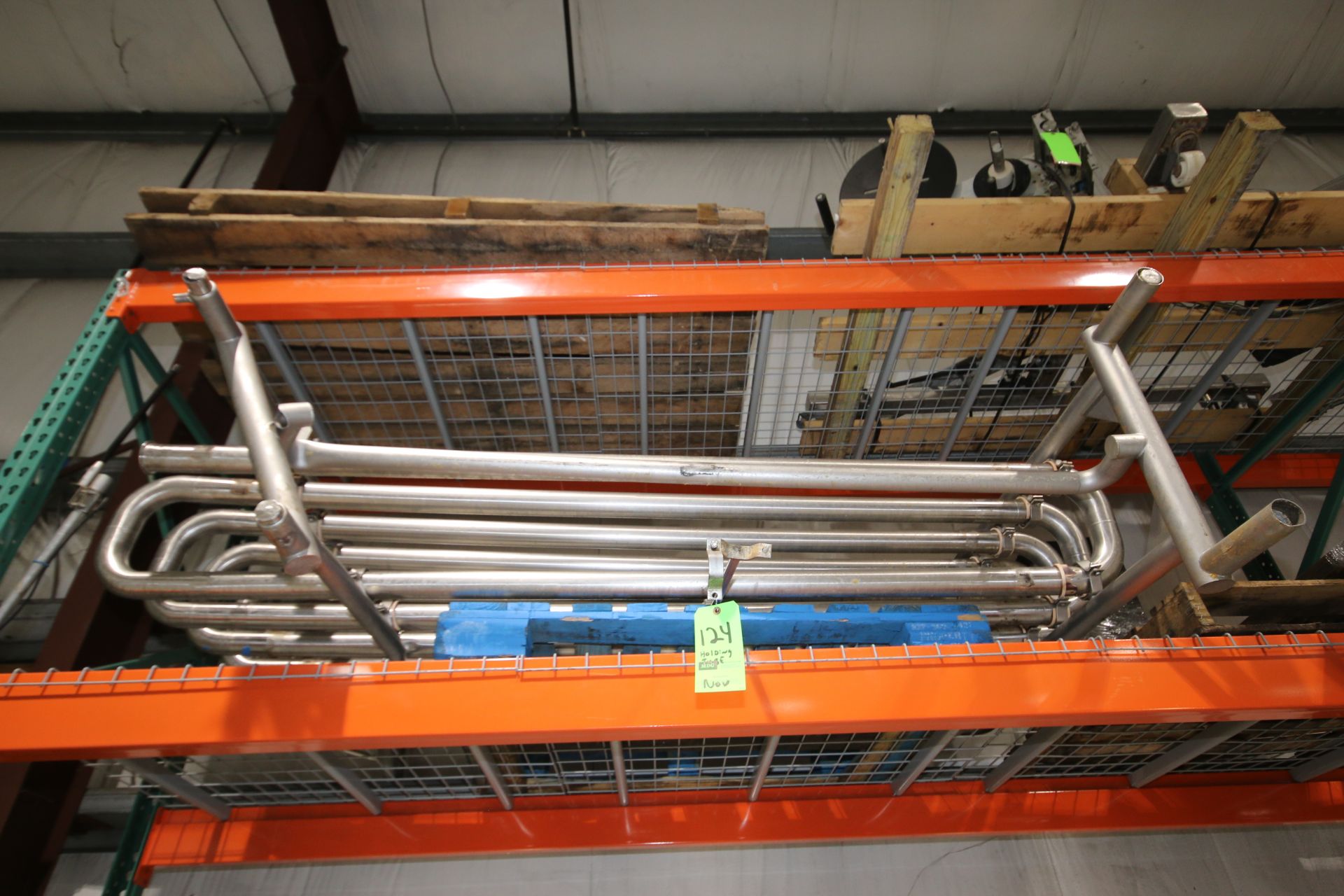 2" S/S Nested Folding Tube Approx. 90" L x 4' H Mounted on S/S Rack, note: Rack Damaged from