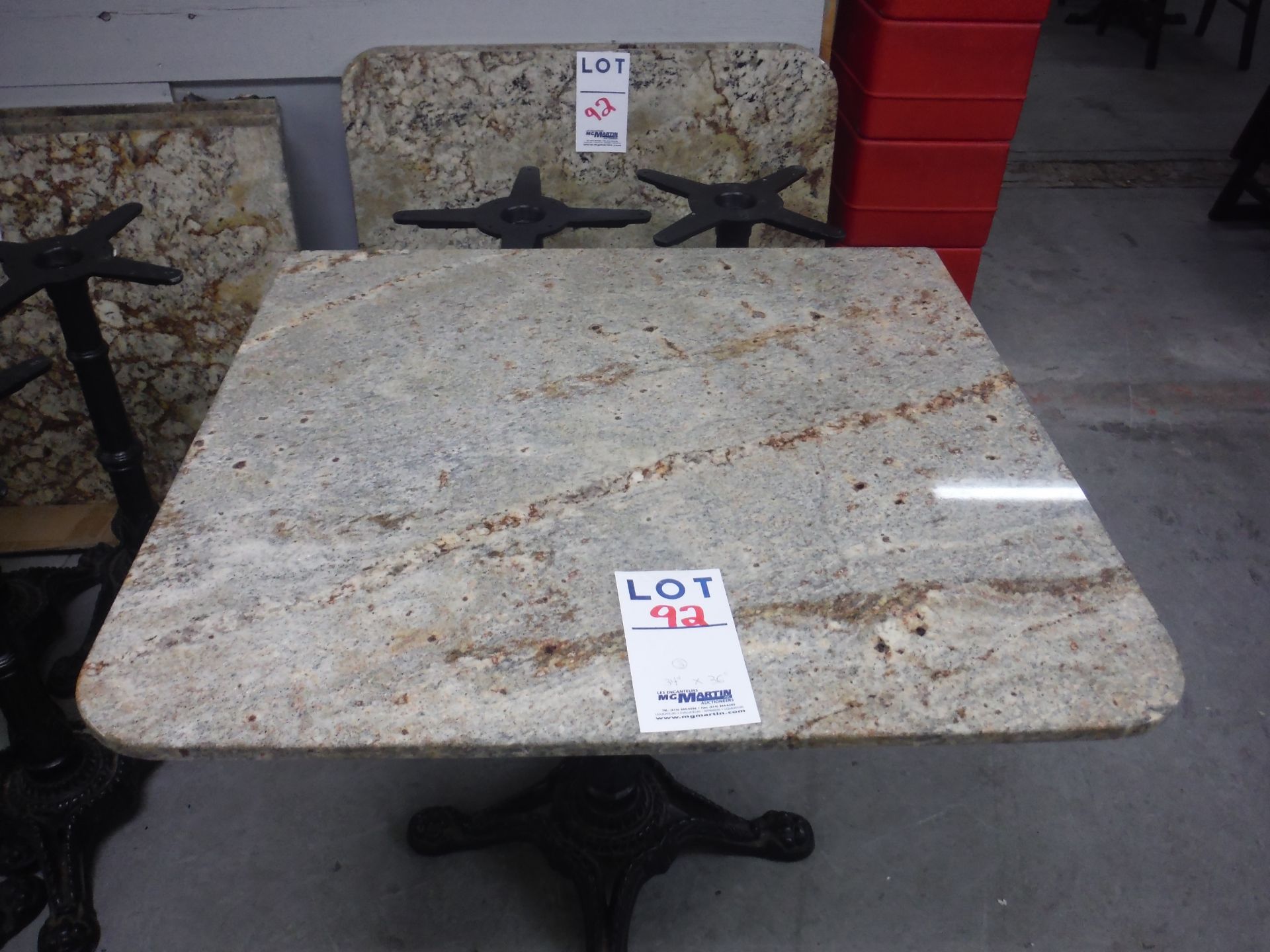 TABLES WITH GRANITE WITH GRANIT TOP AND BASE 34'' X 36'' X 30'' HIGH WITH CAST IRON LEGS