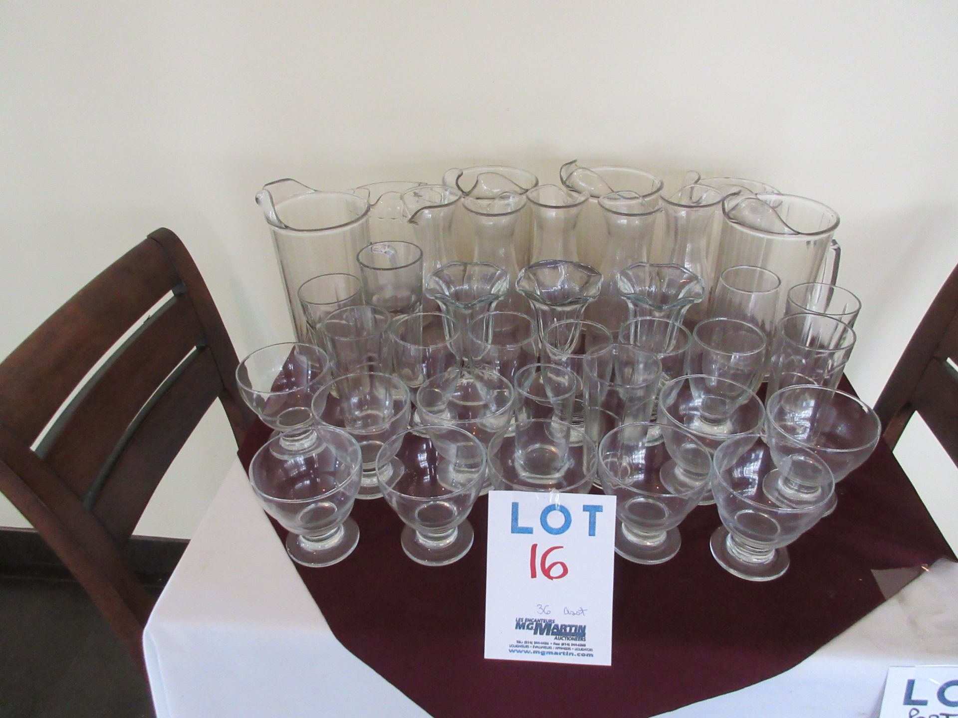 LOT INCLUDING: 36 ASSORTED GLASSES, WATER PITCHERS, CARAFONS, ETC.