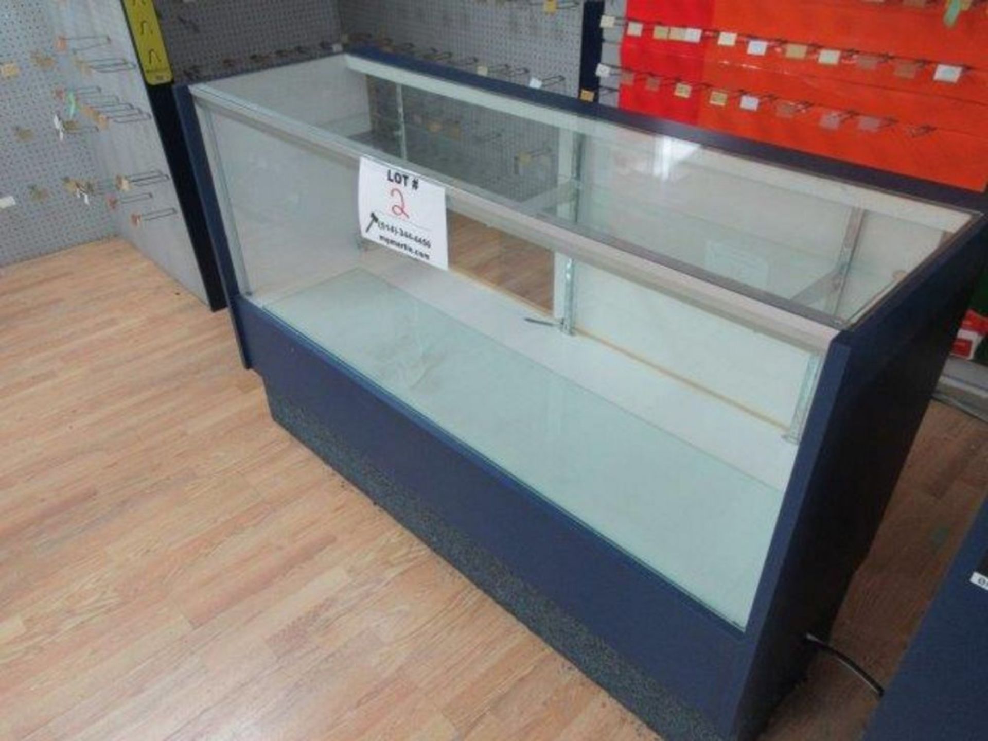 Glass display case 5 Ft. Wide x 20'' Deep x 38'' high