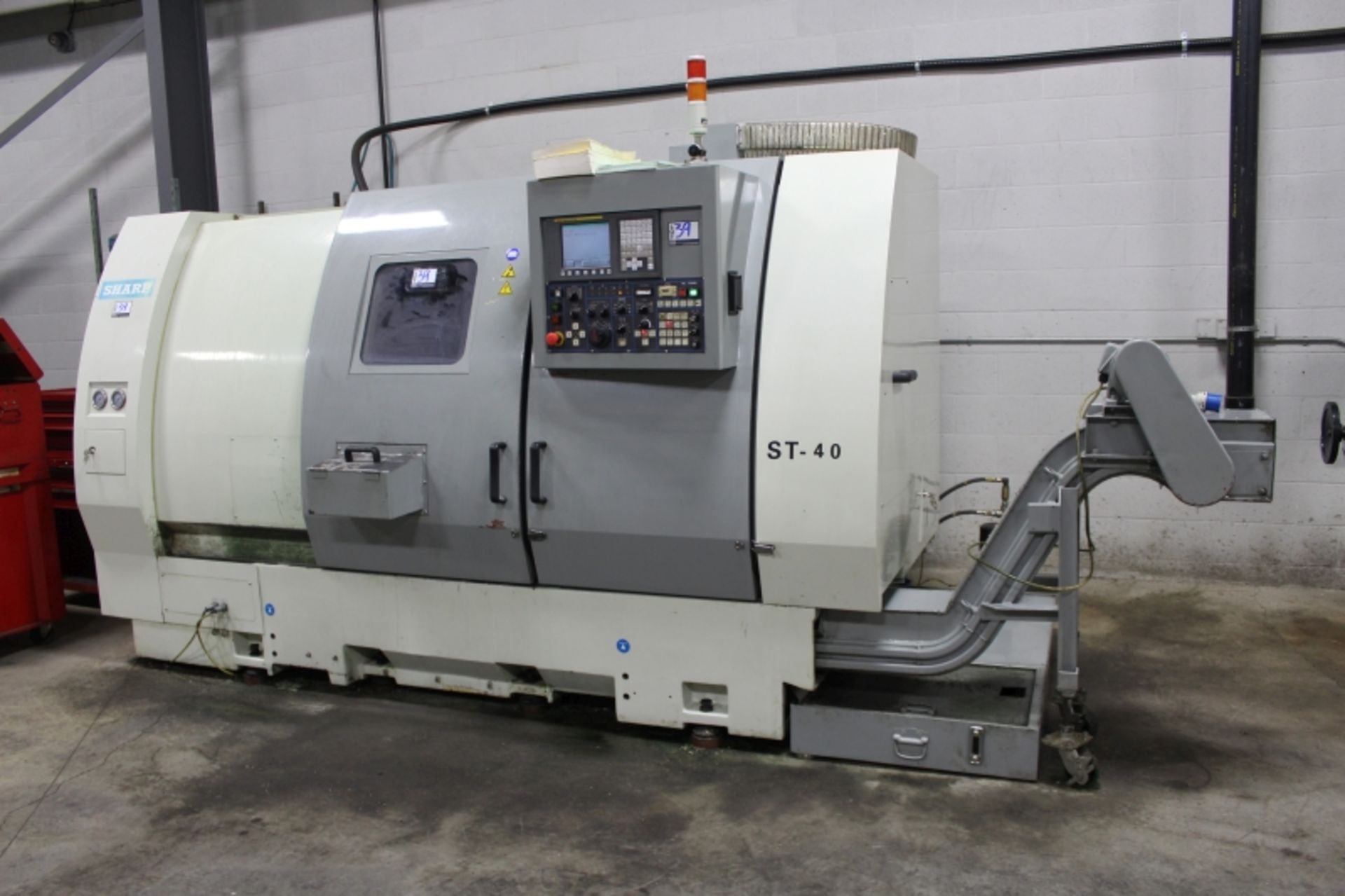 Sharp ST-40, Fanuc 0i-TC, 25” sw, 3” bar cap. 27.6” centers, 3000 RPM, 12" Chuck, S/N 5907218, New - Image 2 of 11