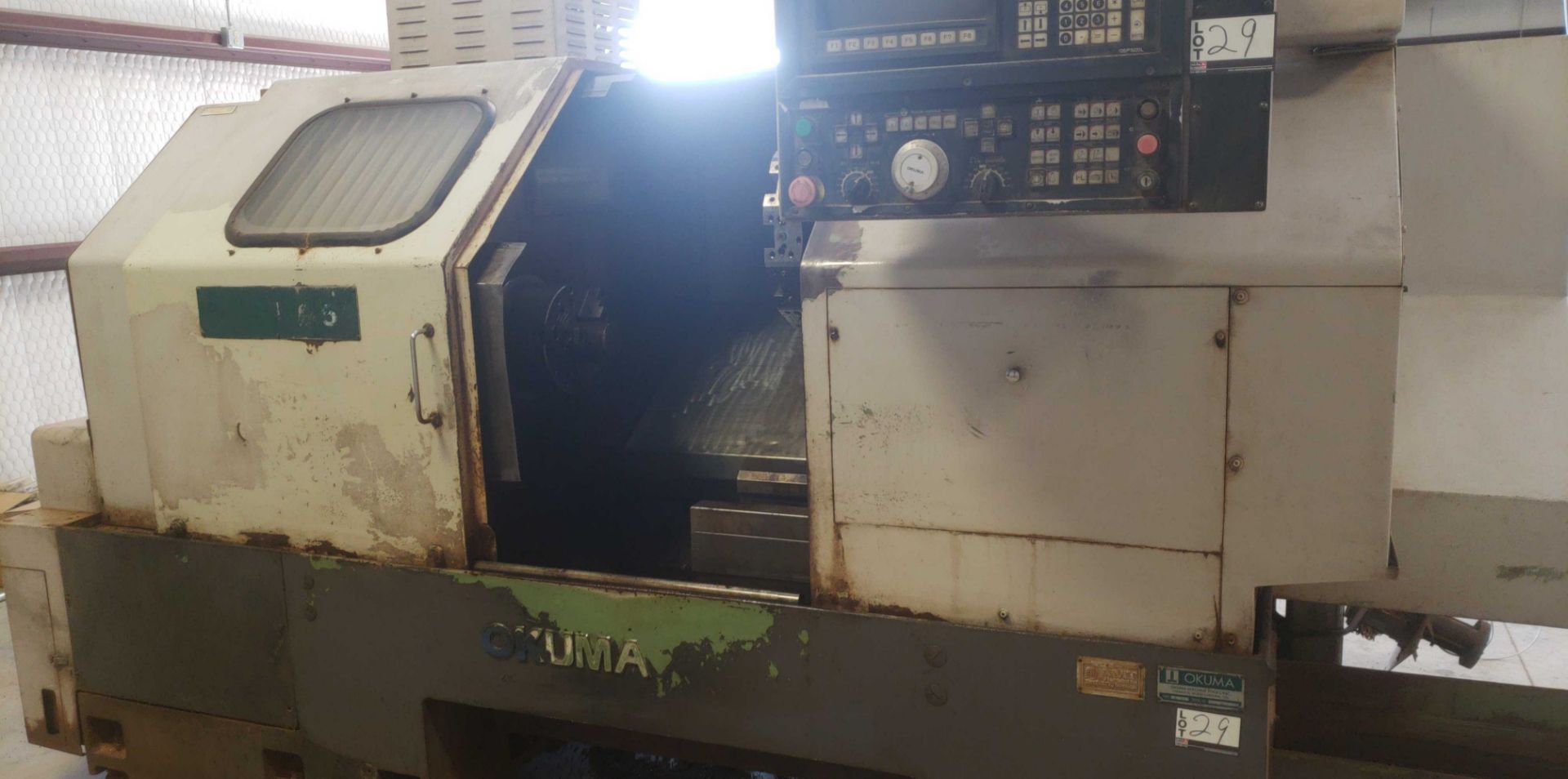 Okuma LB 25 2 Axis CNC lathe, 5020 control, chip conveyor, 10" chuck SN: 06119625