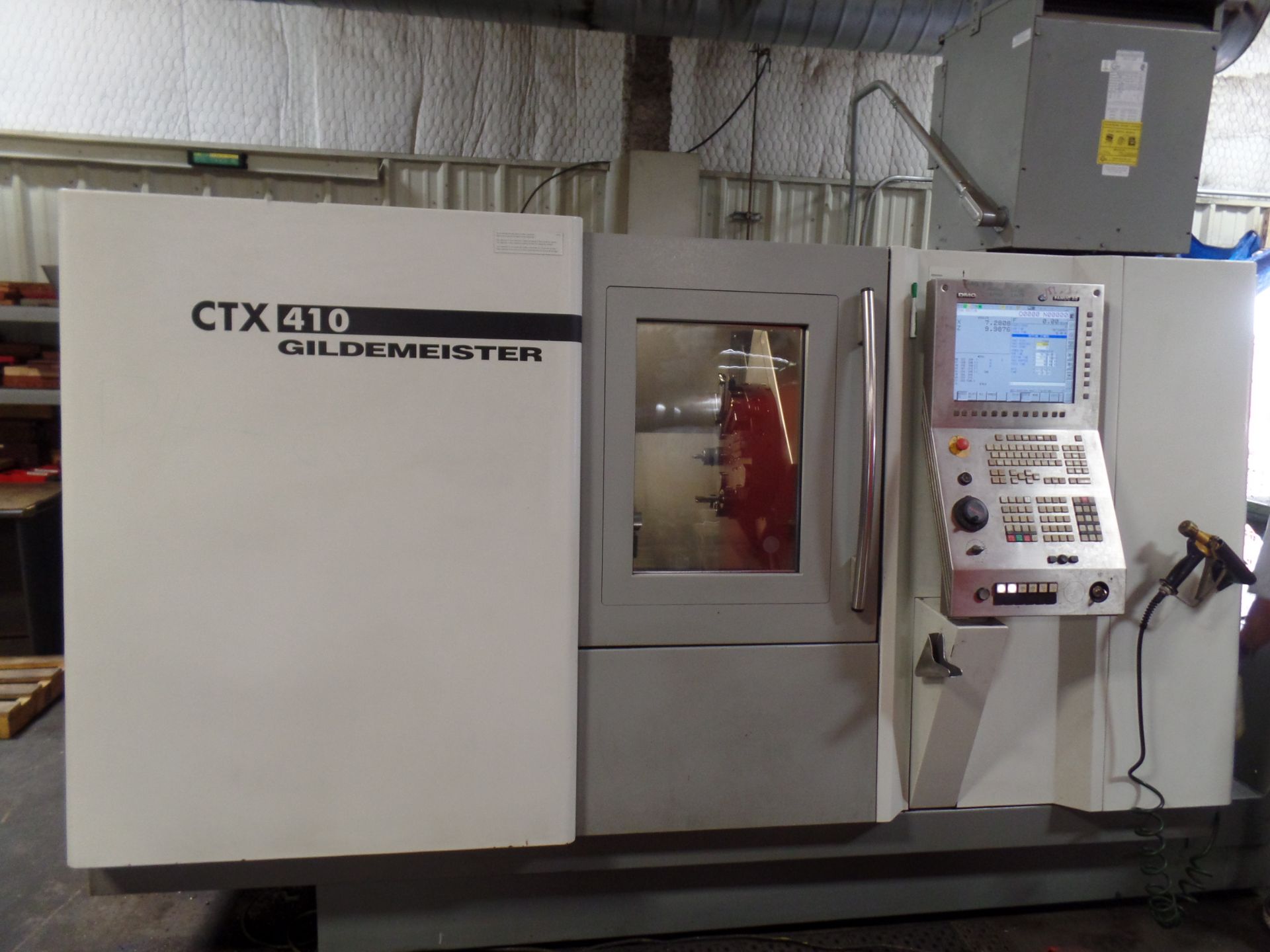 2006 Gildemeister CTX-410 2 Axis CNC Lathe, Fanuc 32i, chip conveyor, 8" chuck SN: 01360006511