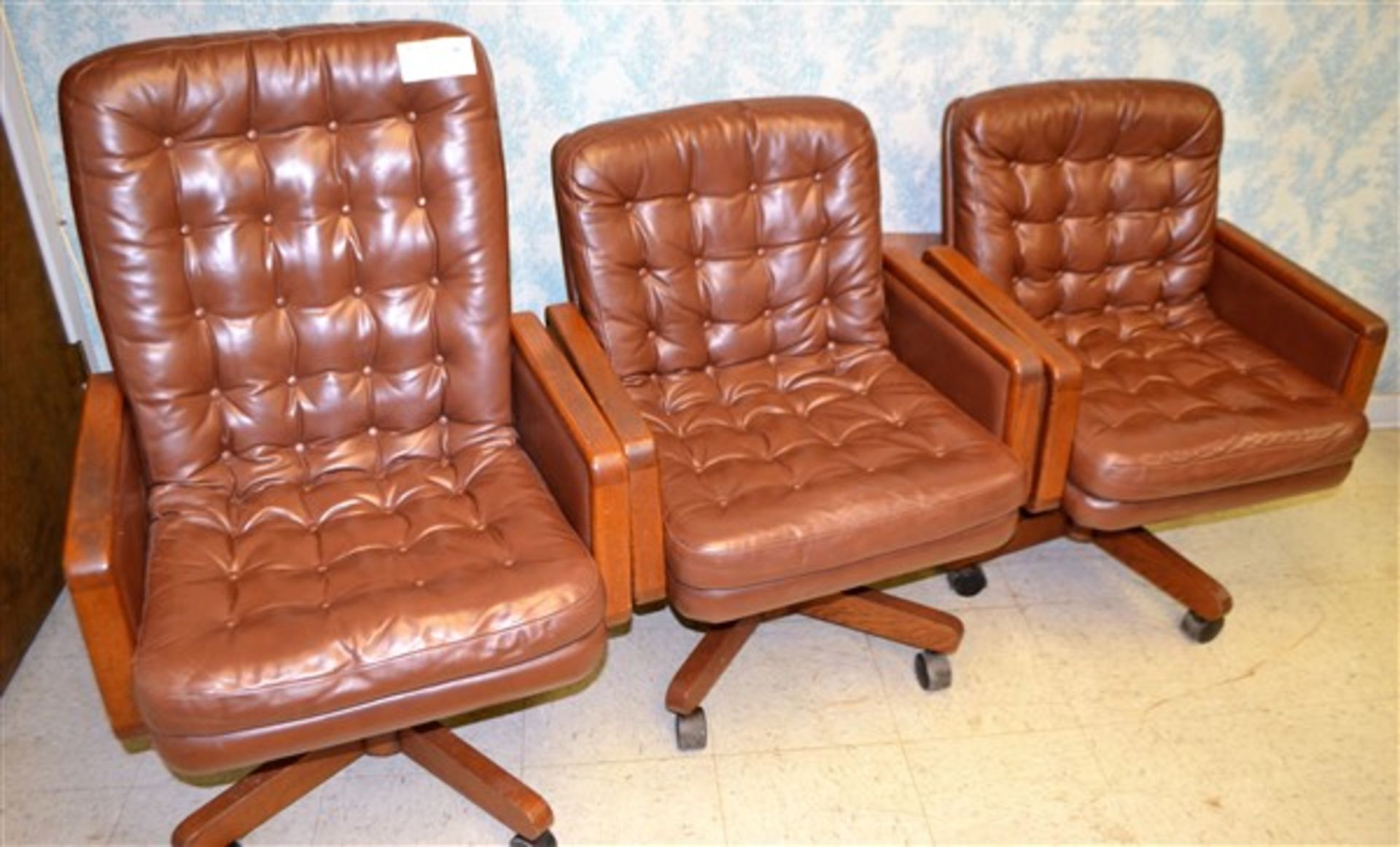 (3) Brown Rolling Chairs