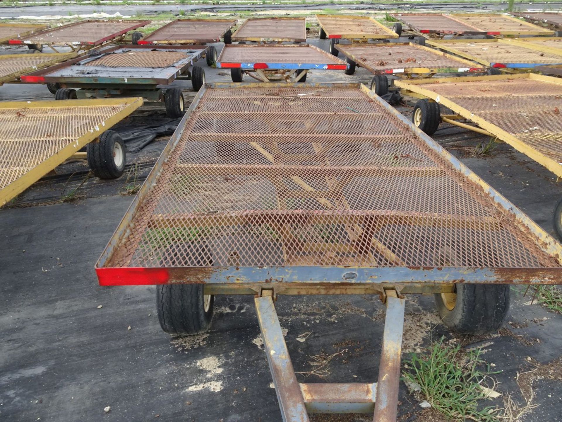 (6) SELF TRACKING TRAILERS, EACH IS PIN STYLE HITCH, EACH TRAILER BED IS 12' LONG x 6' WIDE (FOR - Image 2 of 3