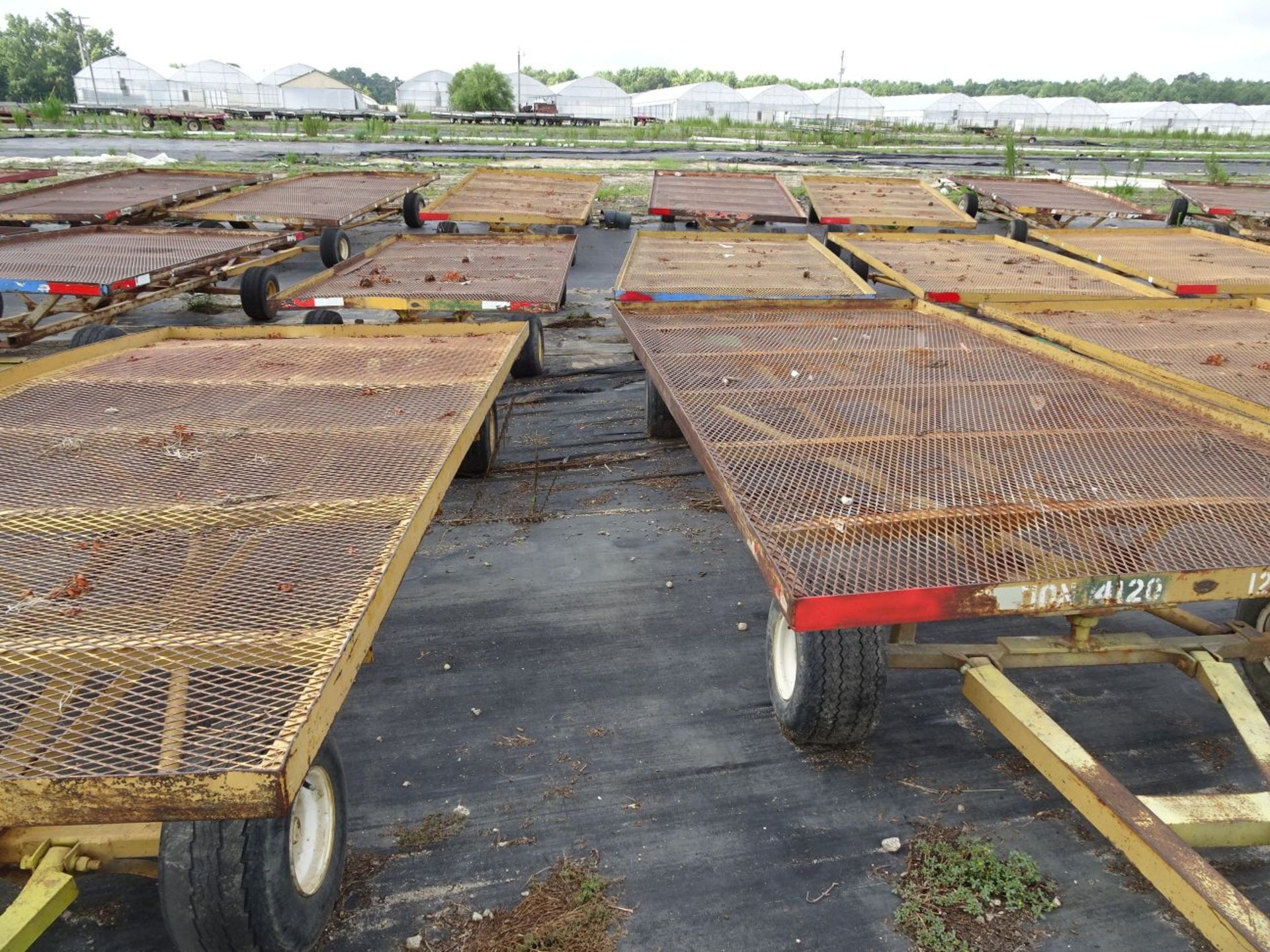 (6) SELF TRACKING TRAILERS, EACH IS PIN STYLE HITCH, EACH TRAILER BED IS 12' LONG x 6' WIDE (FOR - Image 2 of 3
