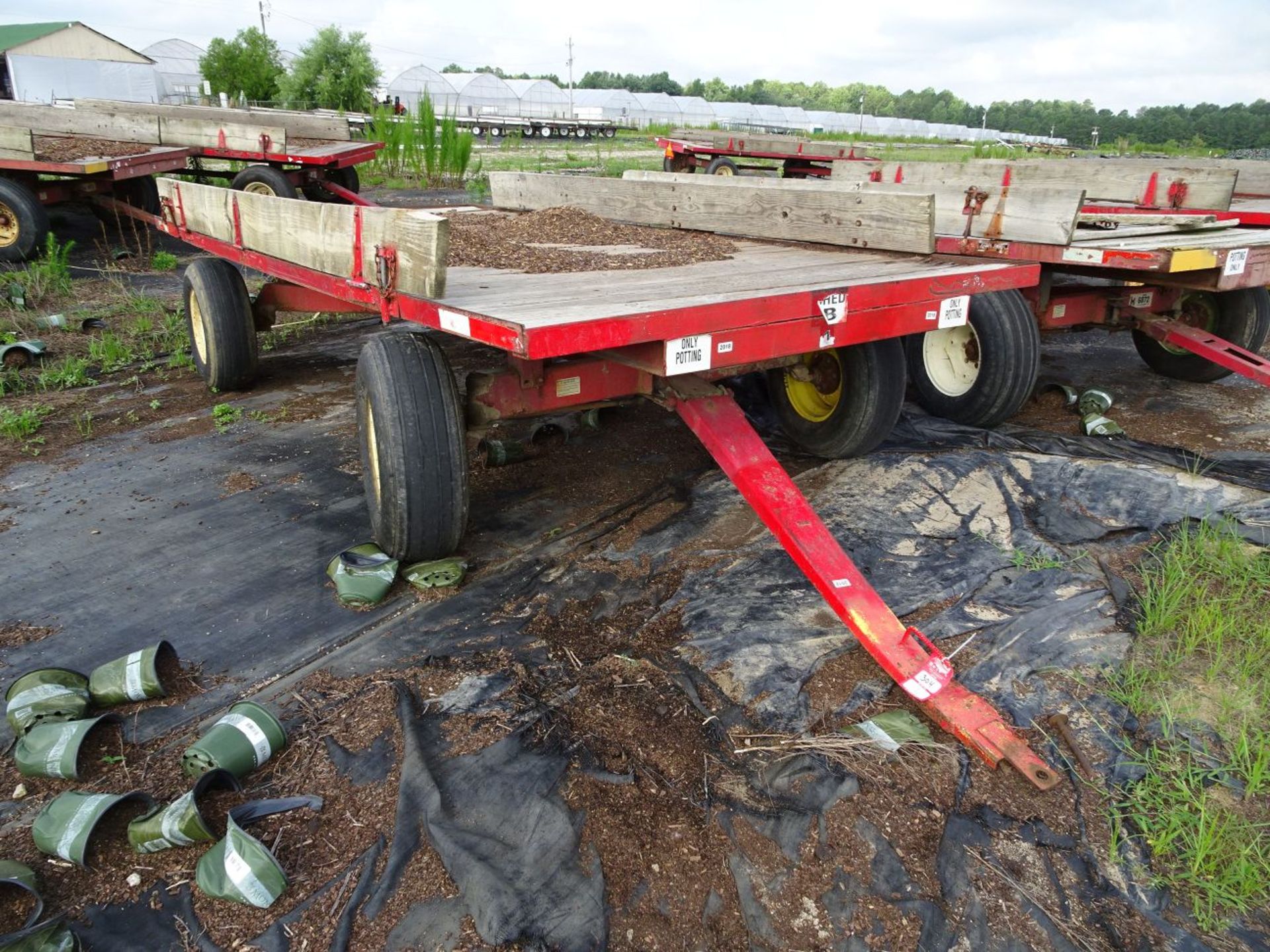 KORY 6872 STEERABLE WAGON, 15' BED, 11L-15 TIRES, WITH HINGED WOOD SIDES (LOCATION: FARM C)