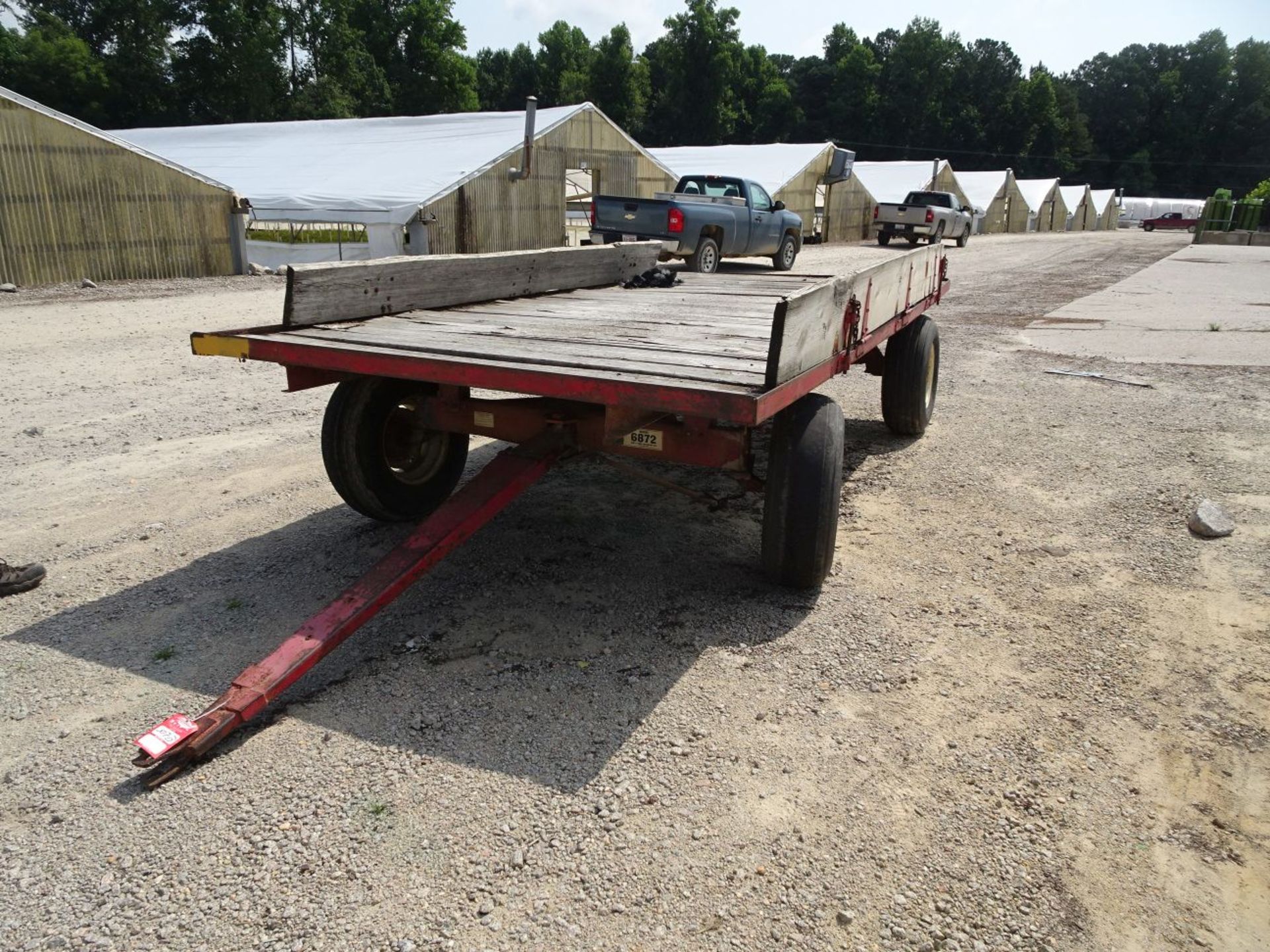 KORY 6872 STEERABLE WAGON, 15' BED, 11L-15 TIRES, WITH HINGED WOOD SIDES (LOCATION: FARM C)