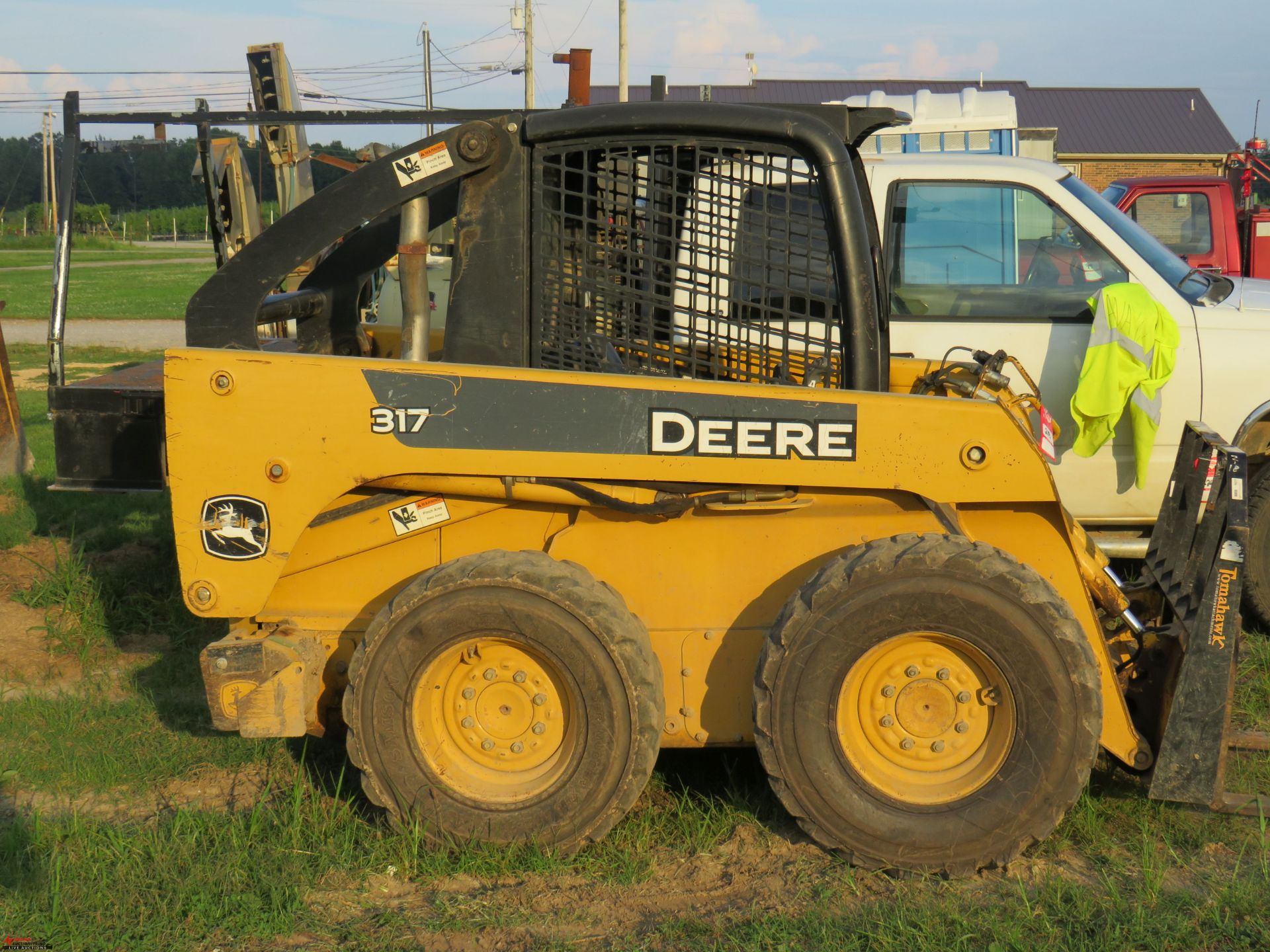 JOHN DEERE 317 RUBBER TIRE SKID STEER, AUXILIARY HYDRAULICS, 12-16.5 TIRES, REAR WEIGHTS, 2972 HOURS