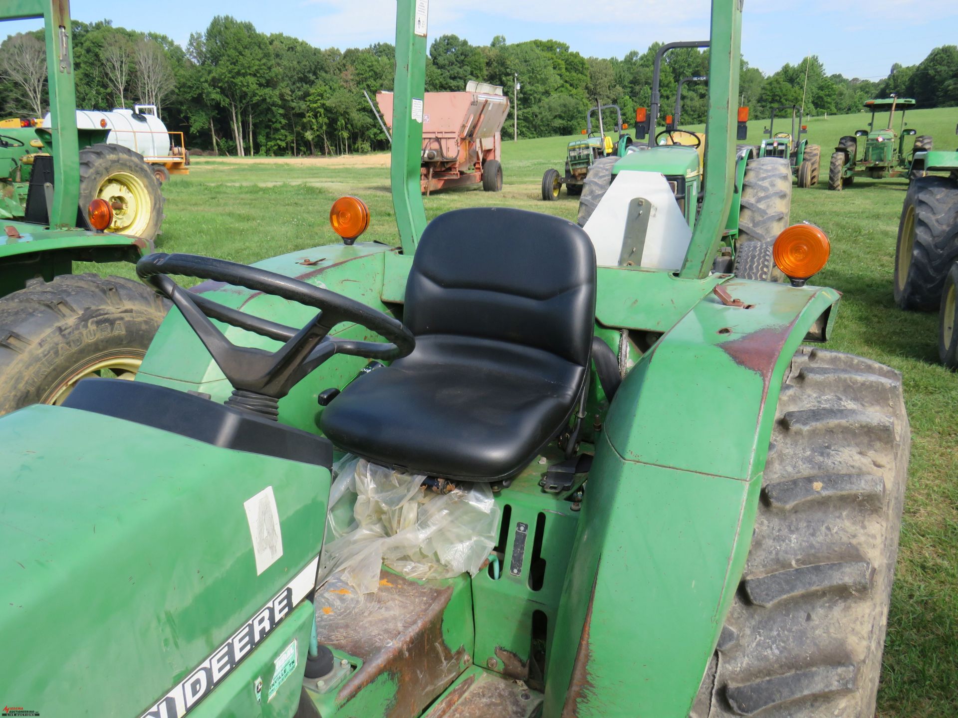 2001 JOHN DEERE 990 TRACTOR, PTO, NO 3PT ARMS, 14.9-24 TIRES, 5555 HOURS SHOWING (HOURS SUBJECT TO - Image 7 of 8