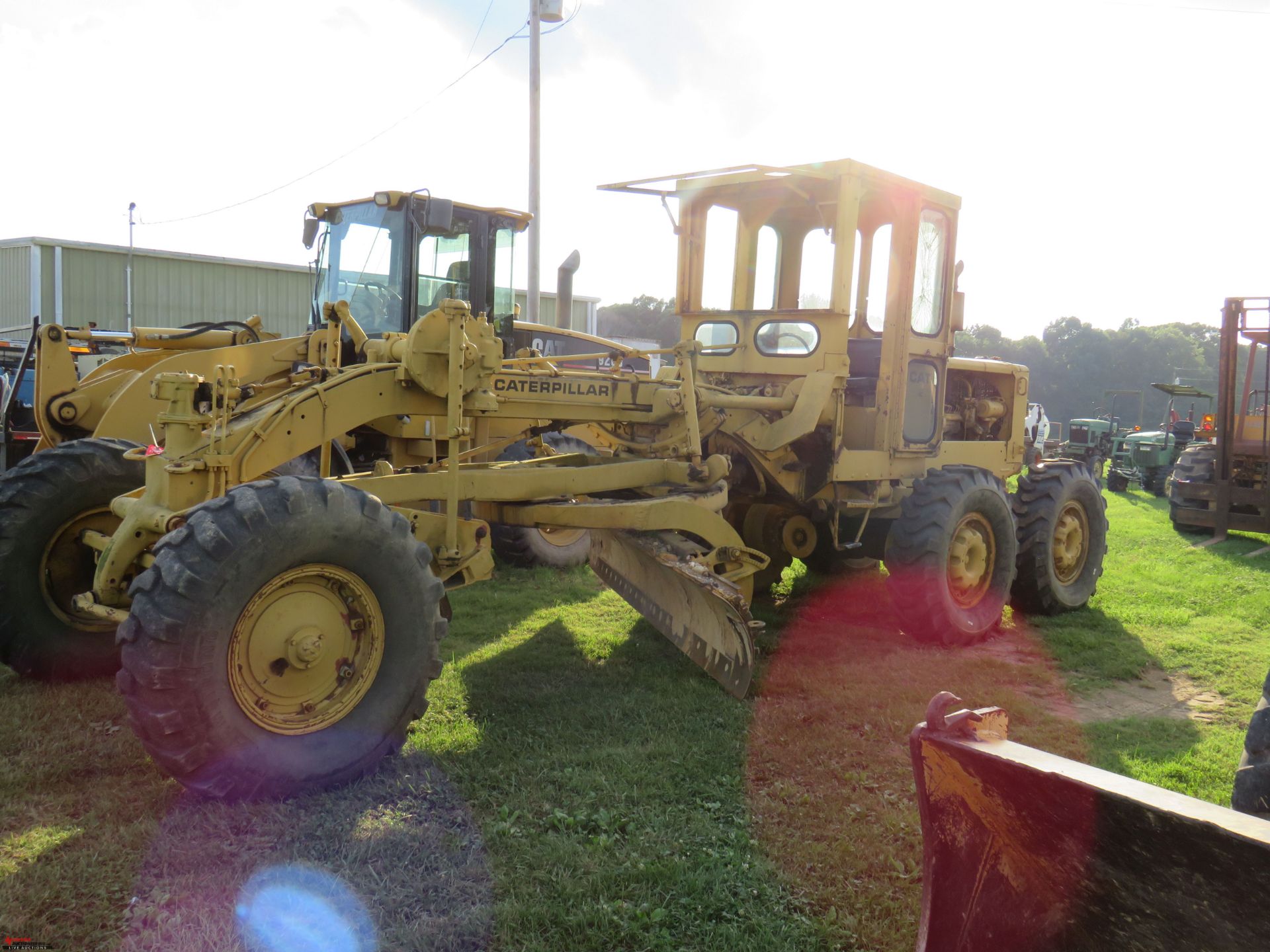 CAT 12 GRADER, 12' BLADE, CAB, SOME BROKEN WINDOWS, NO FRONT WINDSHIELD, HOURS NOT AVAILABLE, S/N