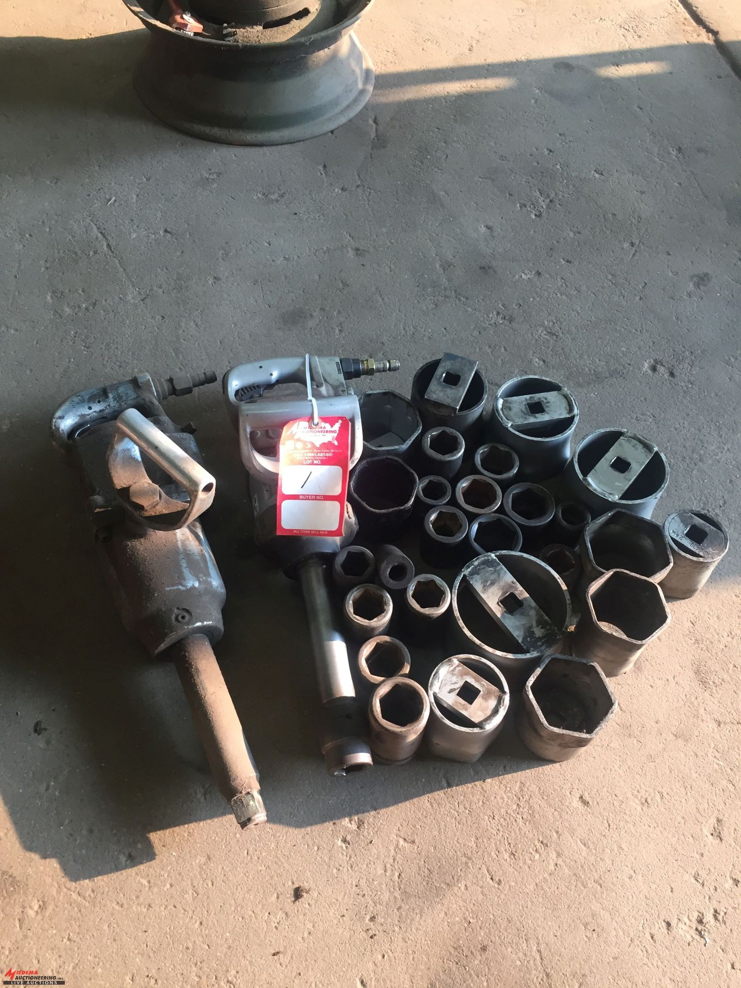 INGERSOLL RAND 1'' PNEUMATIC IMPACT WITH ASSORTED IMPACT SOCKETS AND AXLE TYPE SOCKETS, AND