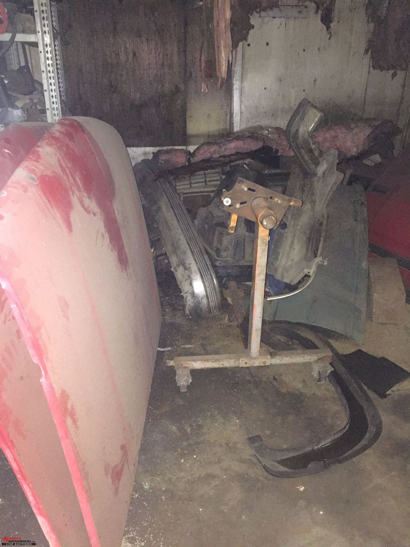 ASSORTED CAR BODY PARTS, ENGINE STAND, METAL CABINET, SMALL BUMPER JACK AND MORE, CONTENTS OF MIDDLE