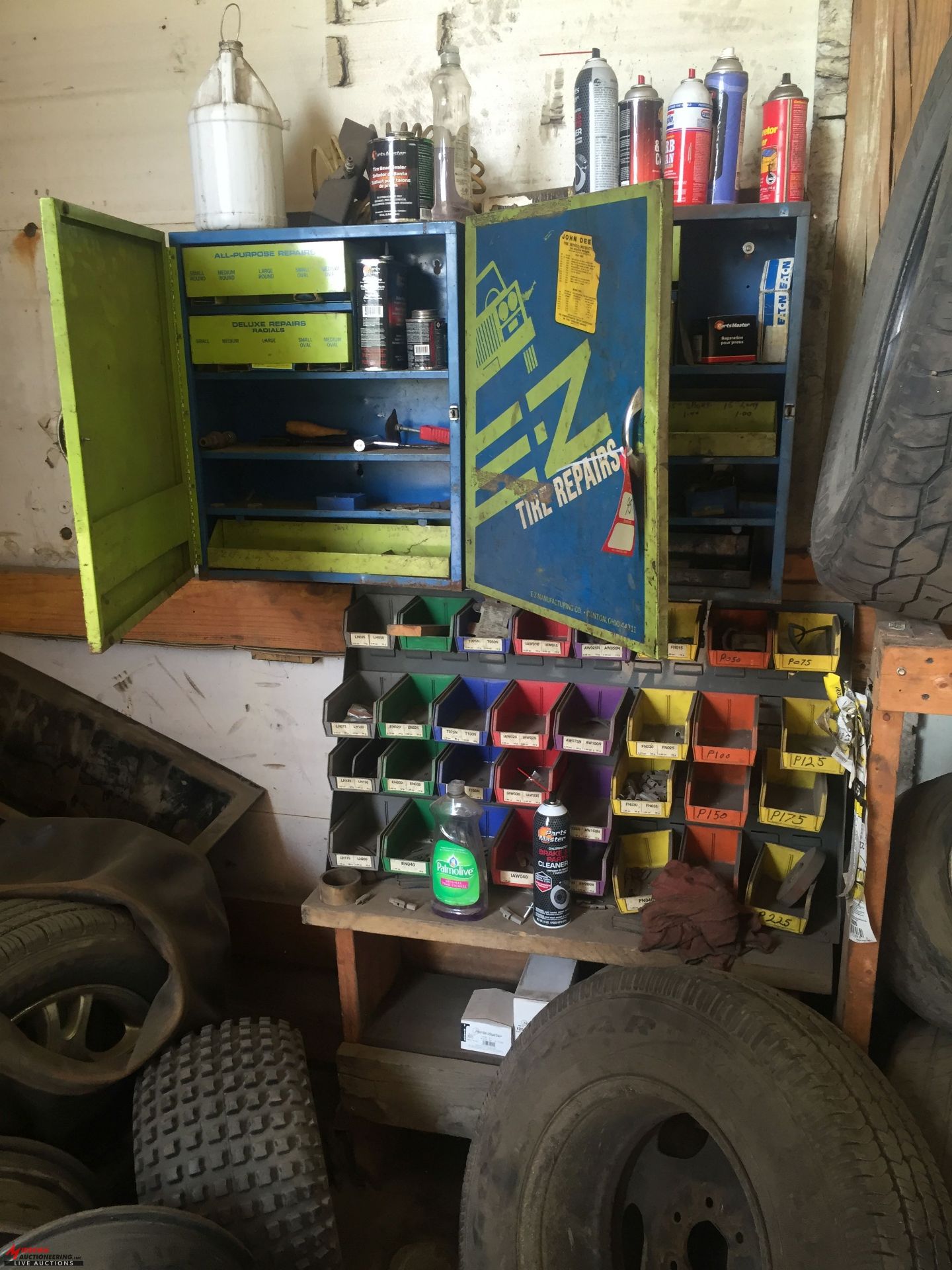 METAL CABINETS (2) WITH ASSORTED TIRE REPAIR TYPE TOOLS, ALSO INCLUDES ASSORTED TIRES AND RIMS [