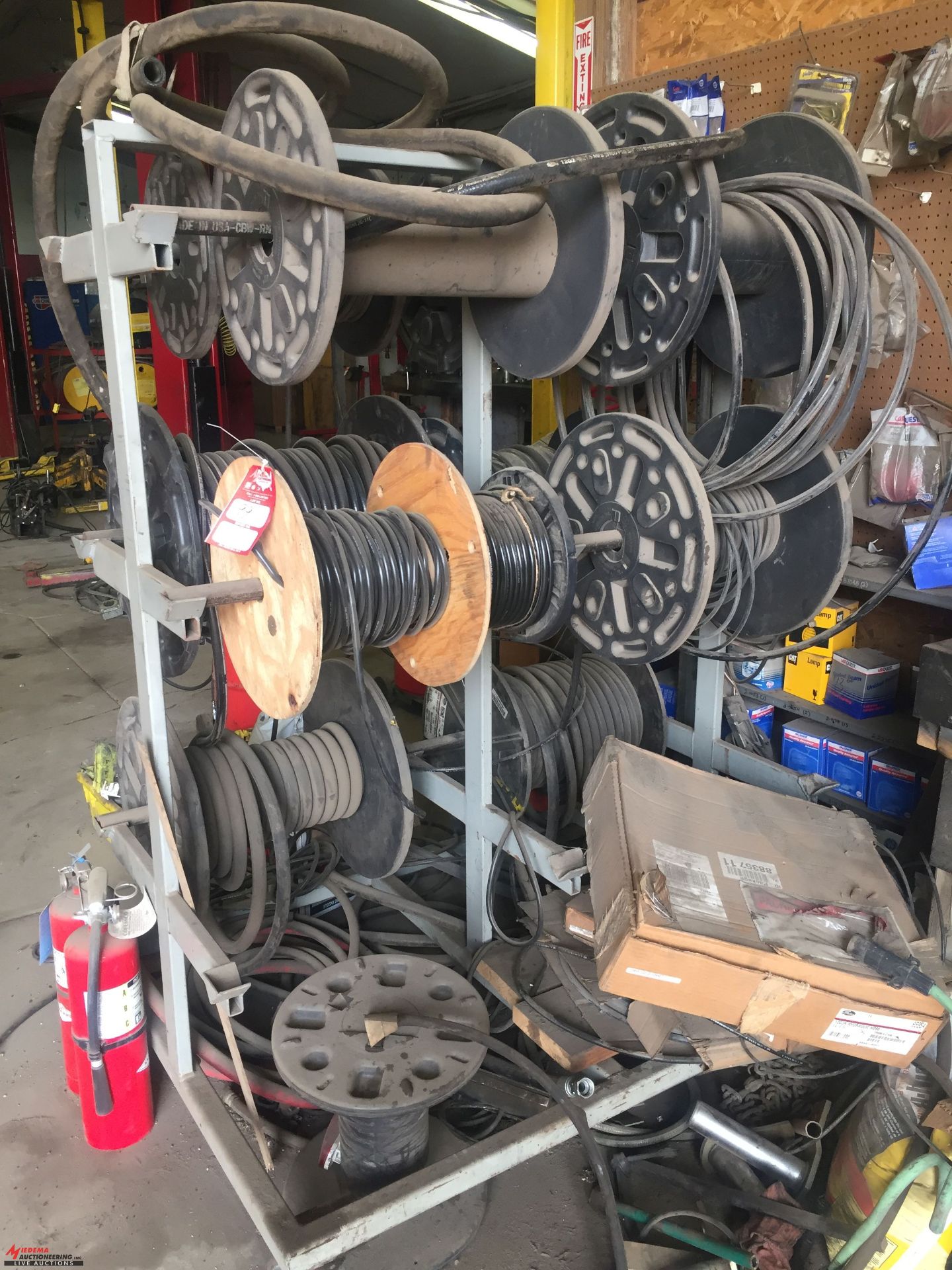 PORTABLE HOSE REEL RACK WITH ASSORTED HYDRAULIC HOSE [LOCATION: EAST WINANS STREET LOCATION] - Image 2 of 2