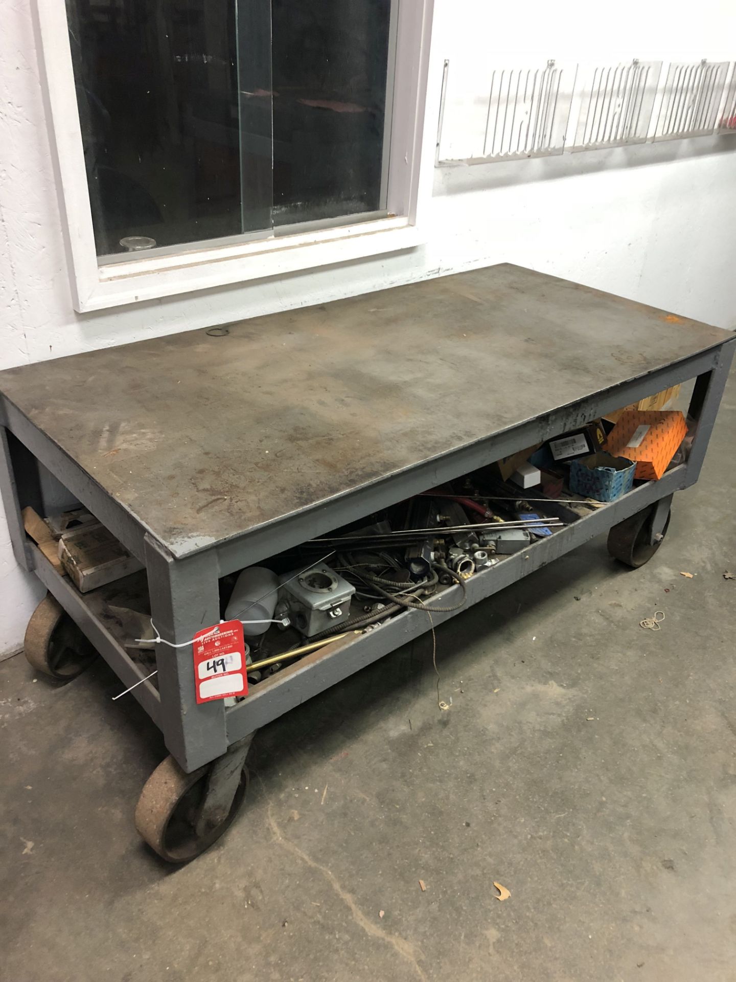 HEAVY DUTY ROLLING TABLE, 61'' LONG x 30'' WIDE x 27'' TALL [CONTENTS ON BENCH NOT INCLUDED] [