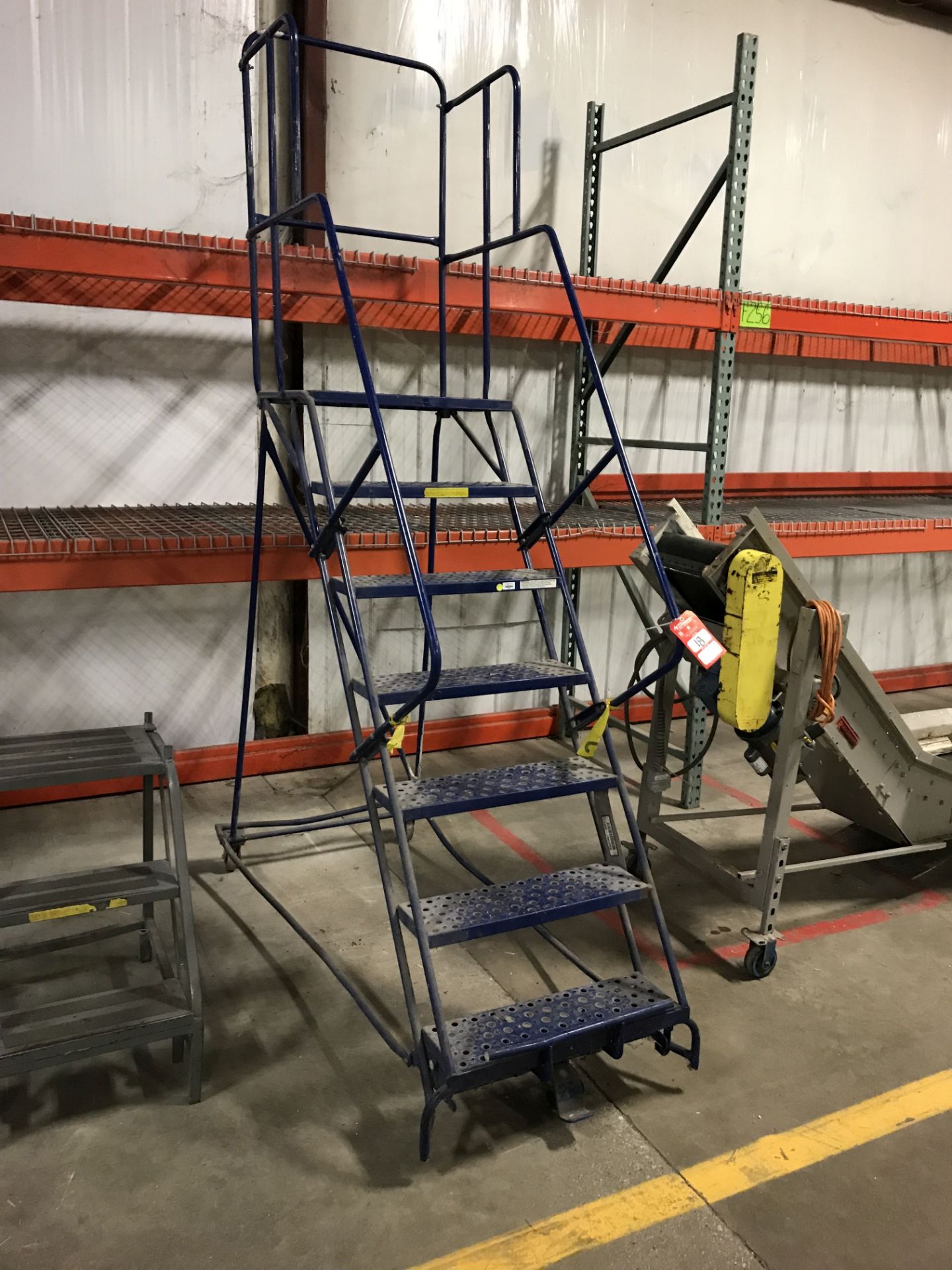 ROLLING WAREHOUSE LADDER, 7' [LOCATION: BUILDING 1]