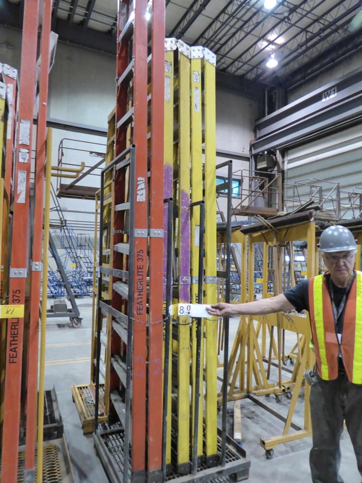 LADDER STORAGE RACK W/ 3 FIBERGLASS LADDERS