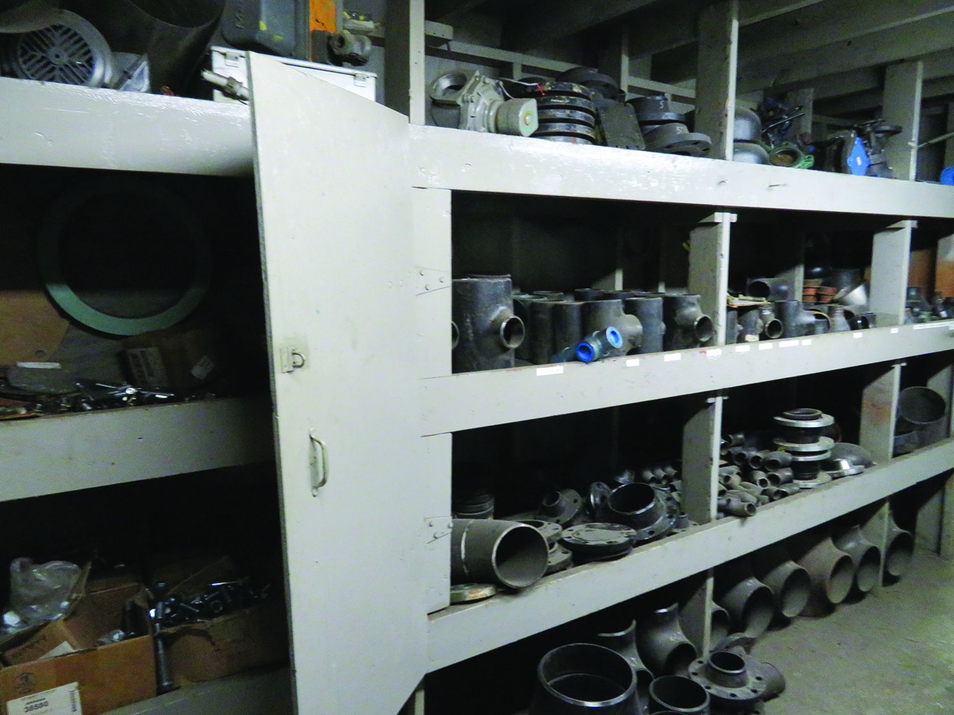 LOT: CONTENTS OF STORAGE ROOM INCLUDING PIPE FITTINGS, VALVES, FLANGES, ETC.