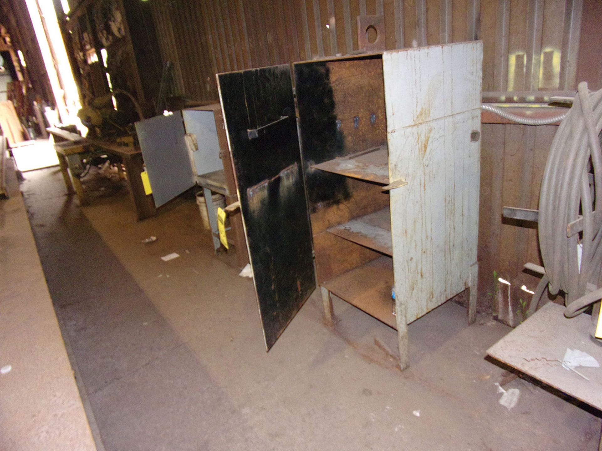 LOT OF METAL CABINETS (ALONG WALL)