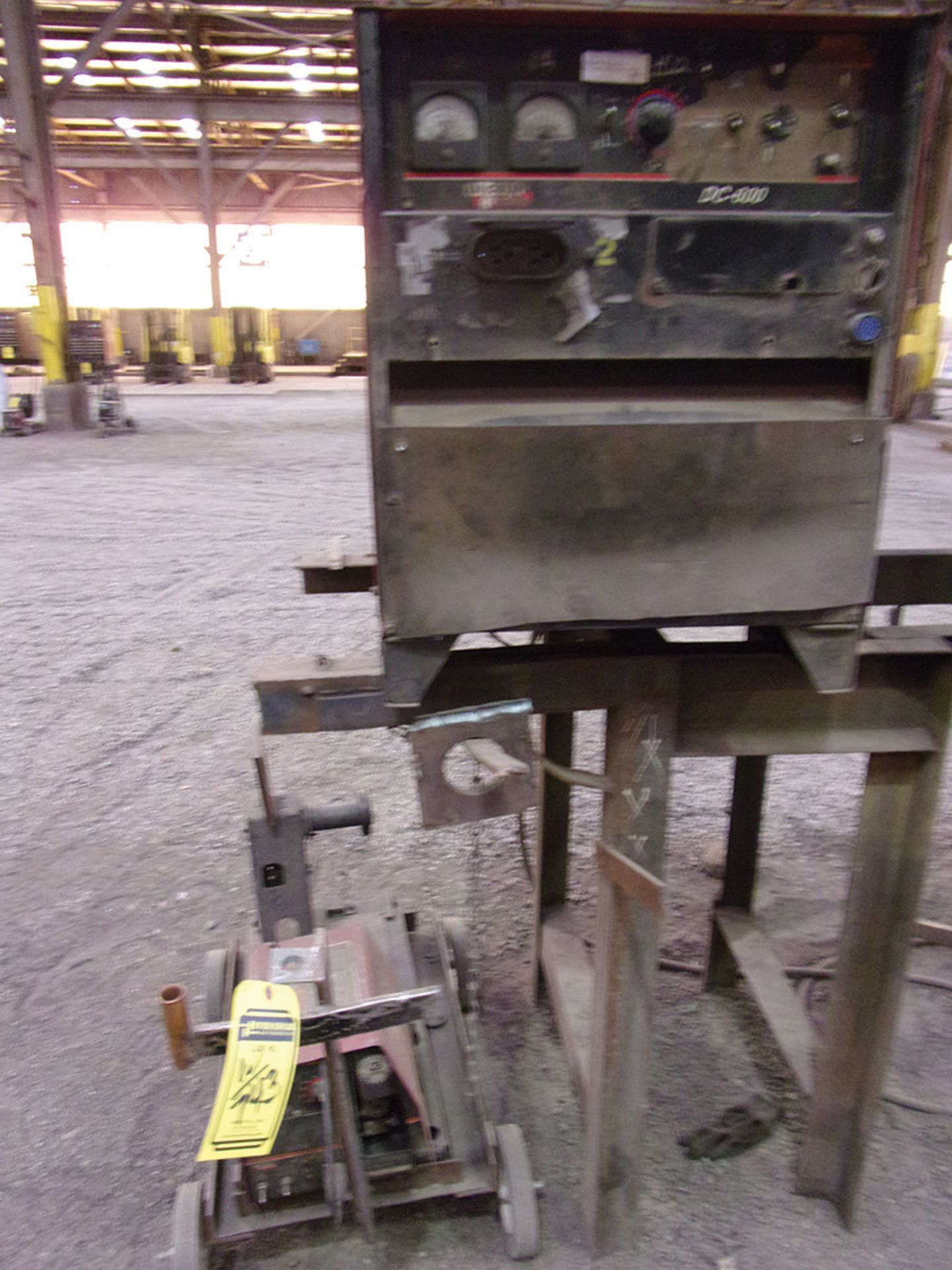 LINCOLN DC-600 WELDER WITH FEEDER, LEED CABLE, AND GROUND