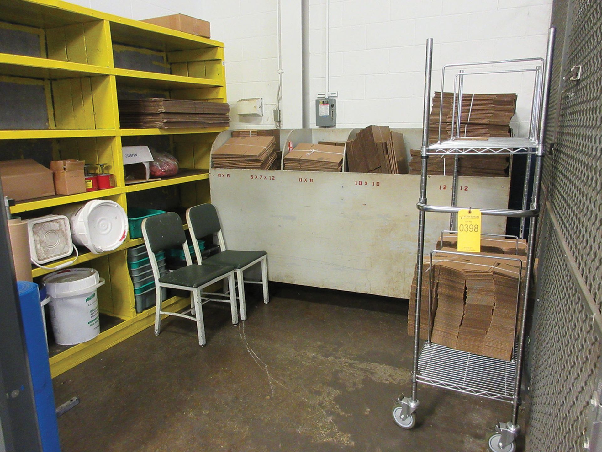 CONTENTS OF CAGE AREA; CARDBOARD BOXES, PLASTIC, AND METRO CART