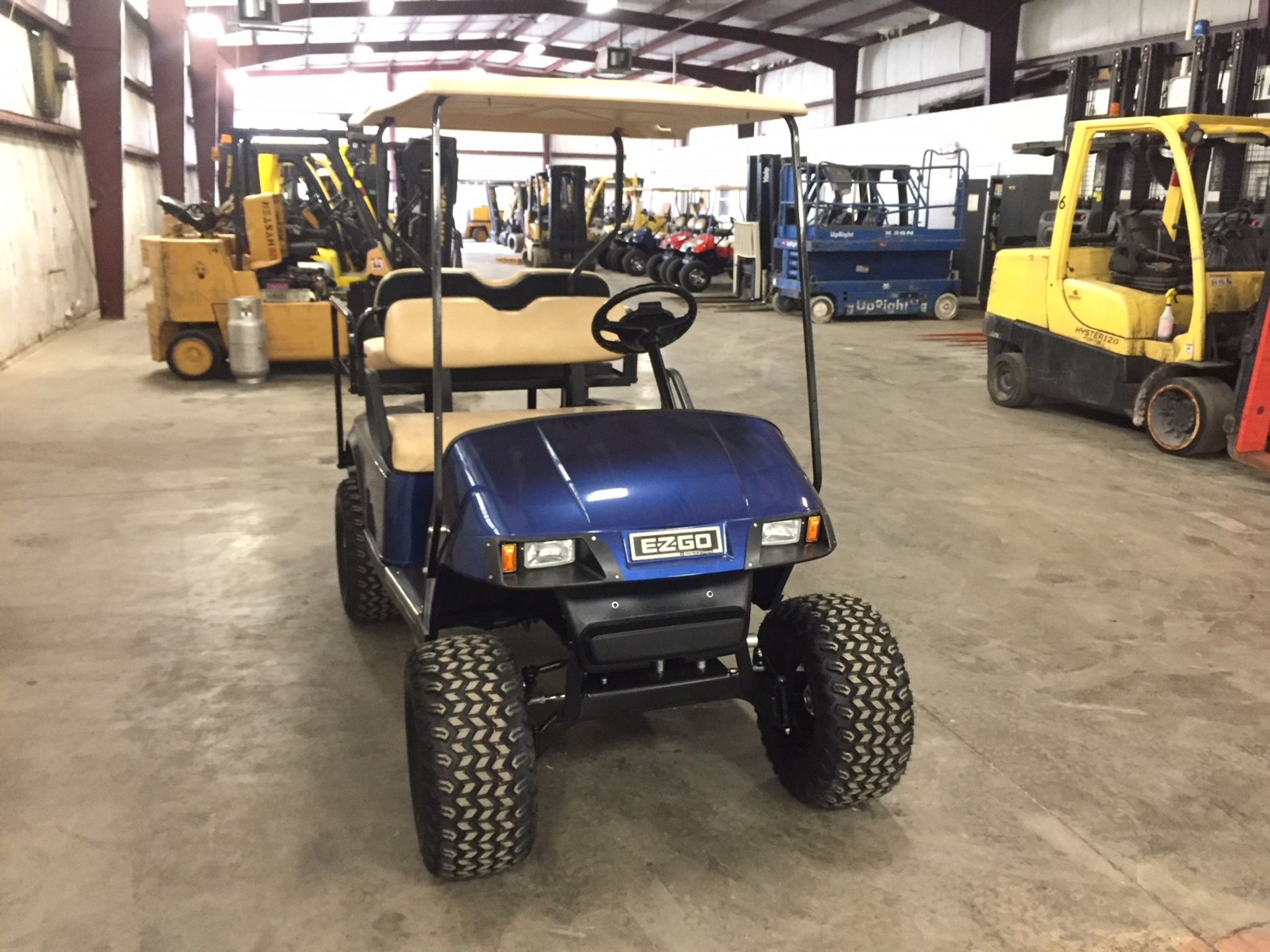 2010 EZGO PDS ELECTRIC GOLF CART, WITH 36 VOLT CHARGER, 4-PASSENGER FOLD DOWN SEAT, LIFT KIT, - Image 4 of 5