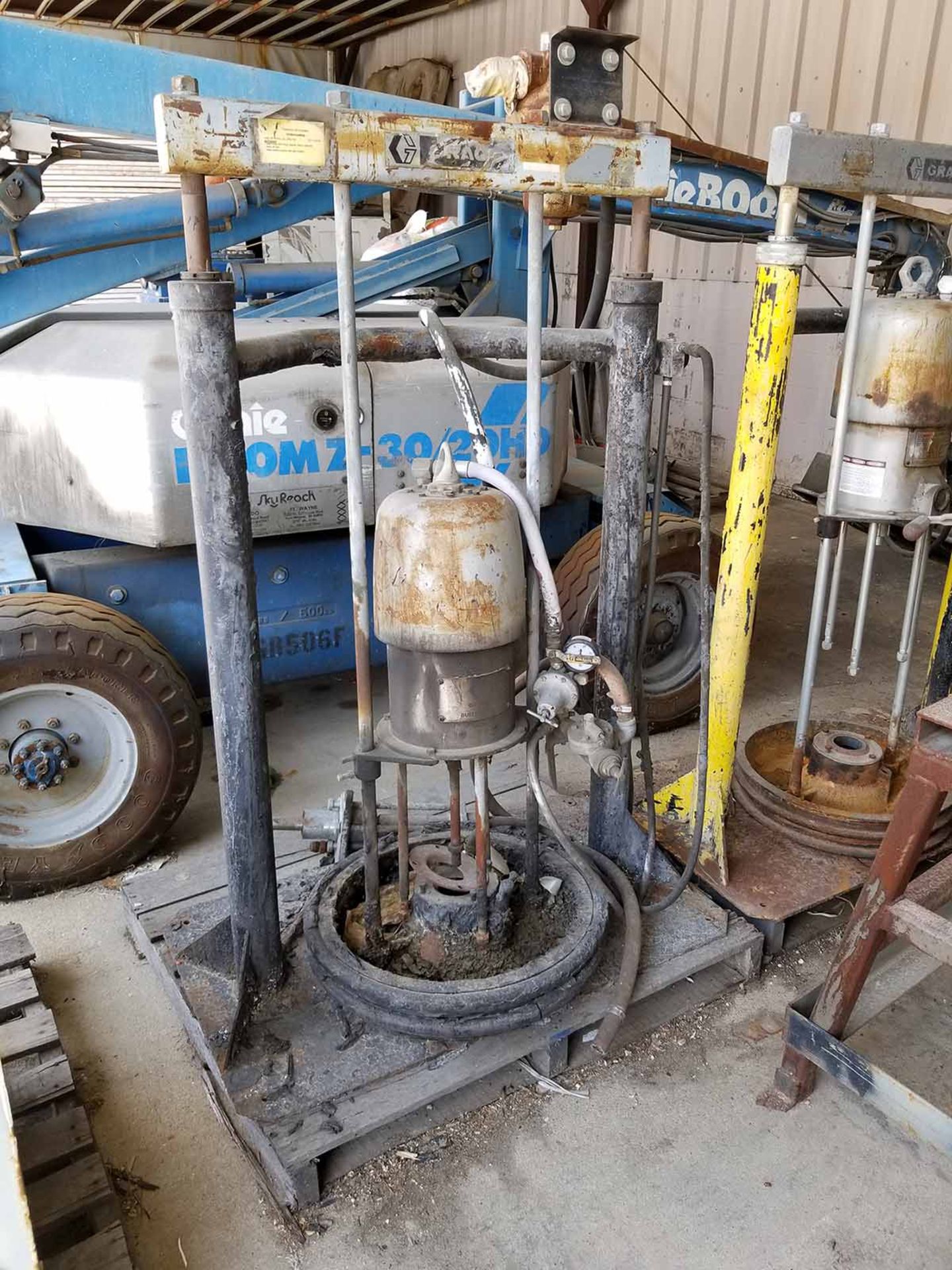 (3) GRACO VERTICAL PUMPS & UNKNOWN MACHINE (IN NEED OF MAJOR REPAIR)