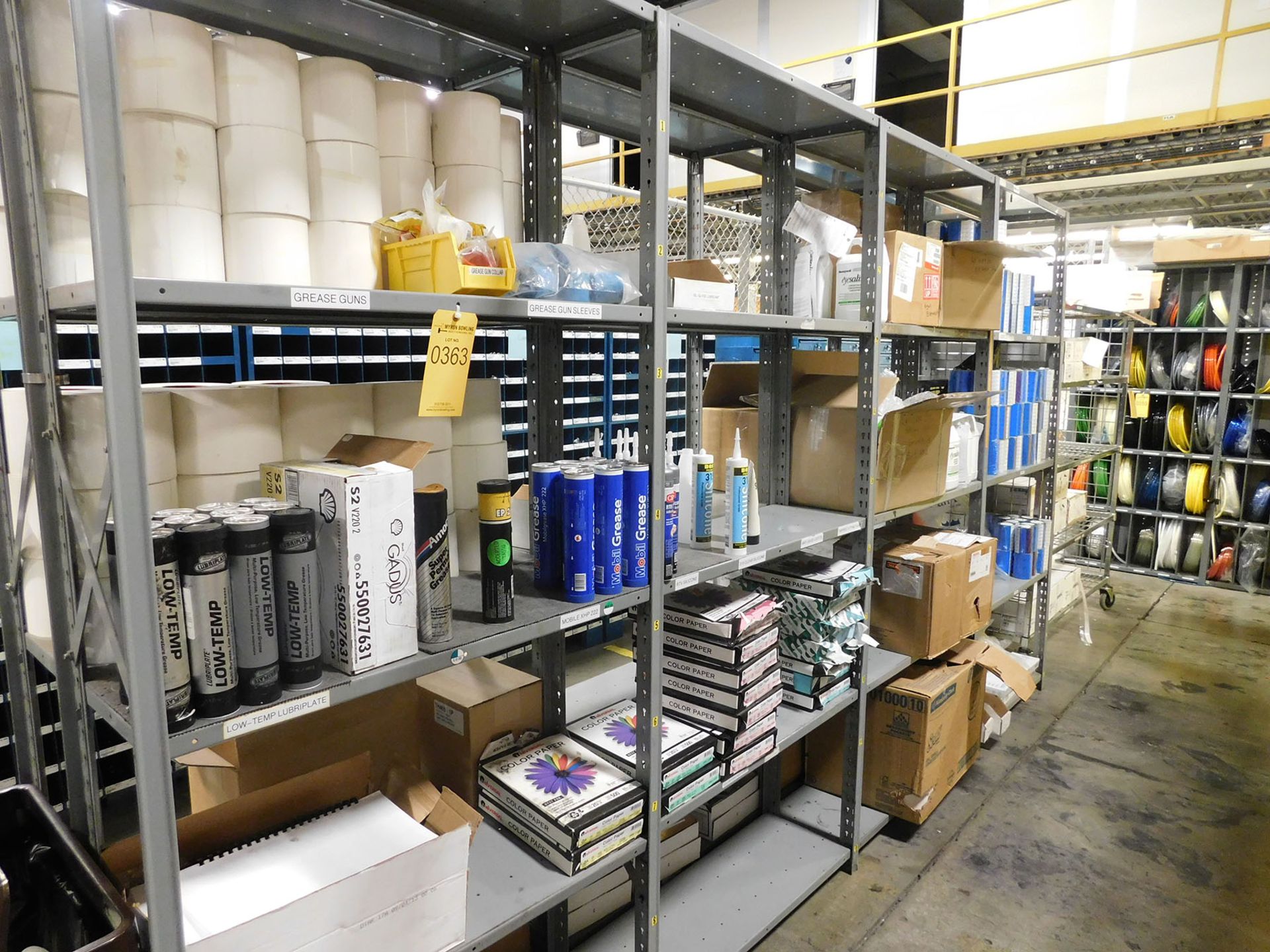 SHELF WITH CONTENT; COLORED PAPER, GREASE, AND SILICONE