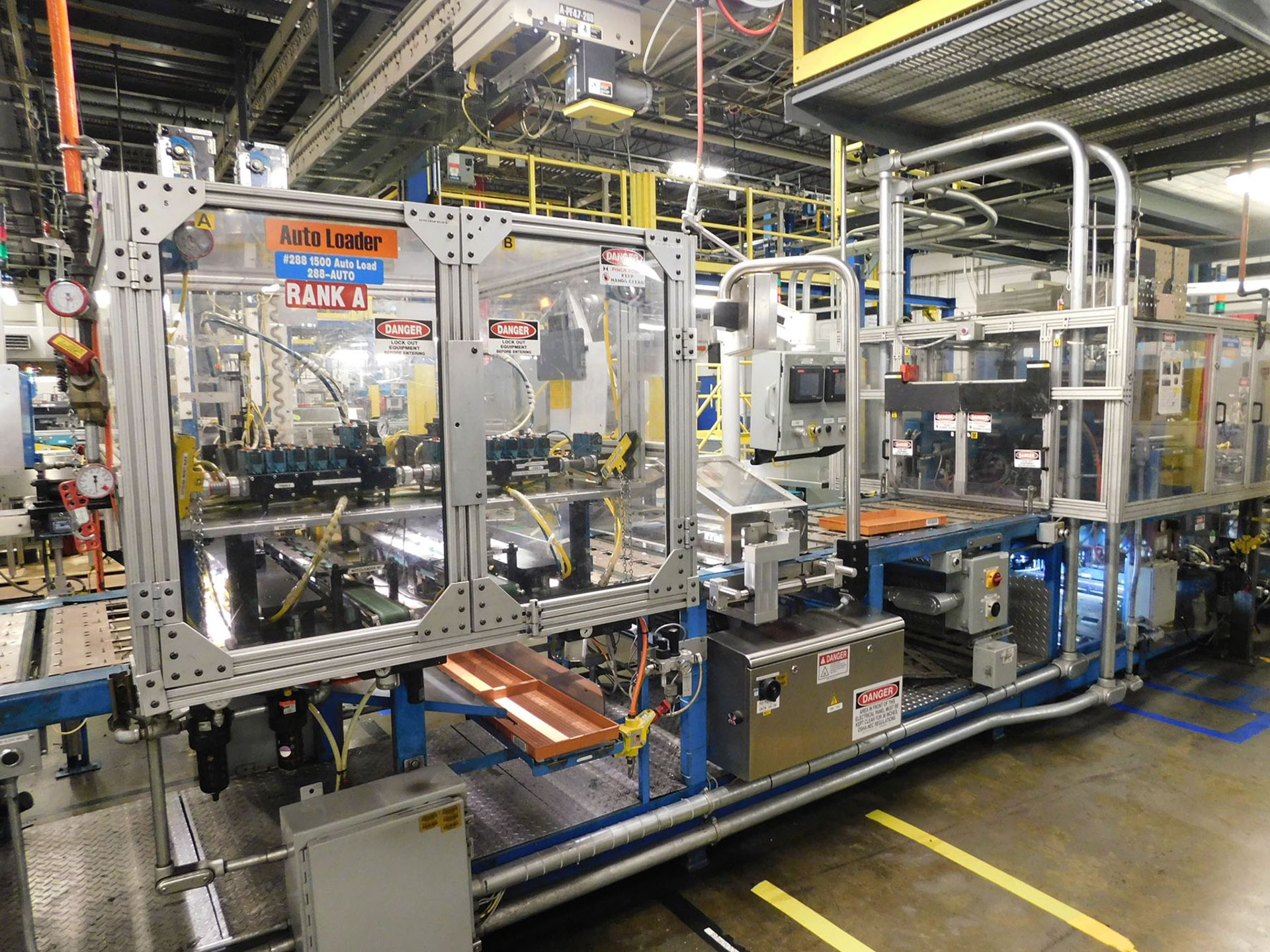 AA DURACELL BLISTER PACK LINE WITH FOLD OVER CASE PACKER, MOTORIZED ROLLER CONVEYOR AND ELEVATOR