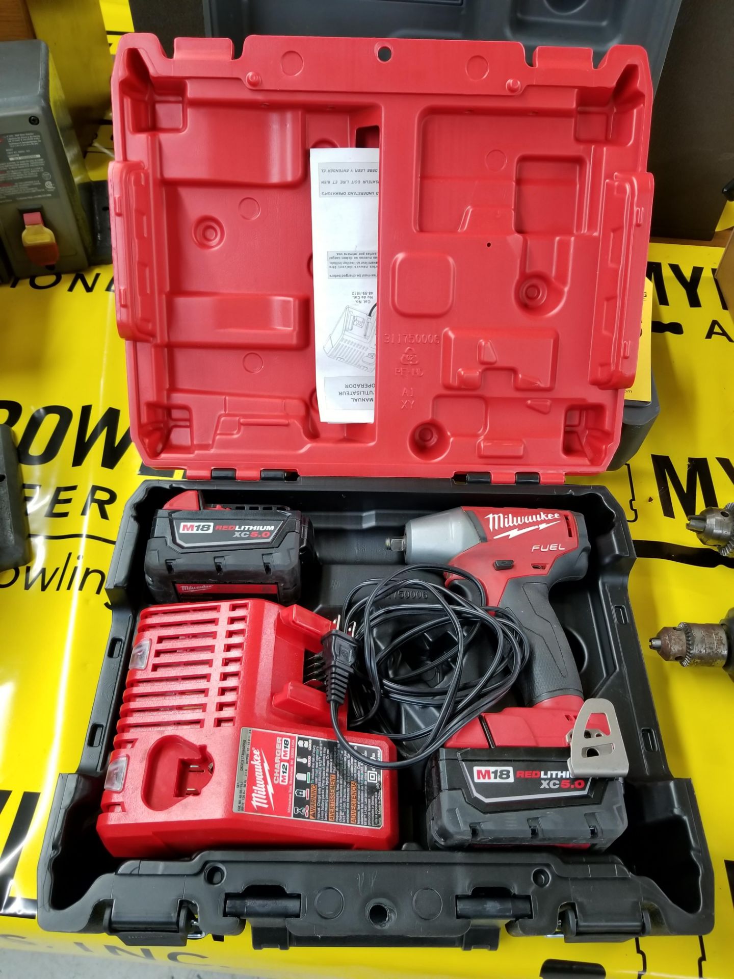 MILWAUKEE FUEL 3/8" CORDLESS IMPACT WRENCH WITH CASE, CHARGER, & (2) RED LITHIUM XC 5.0 BATTERIES