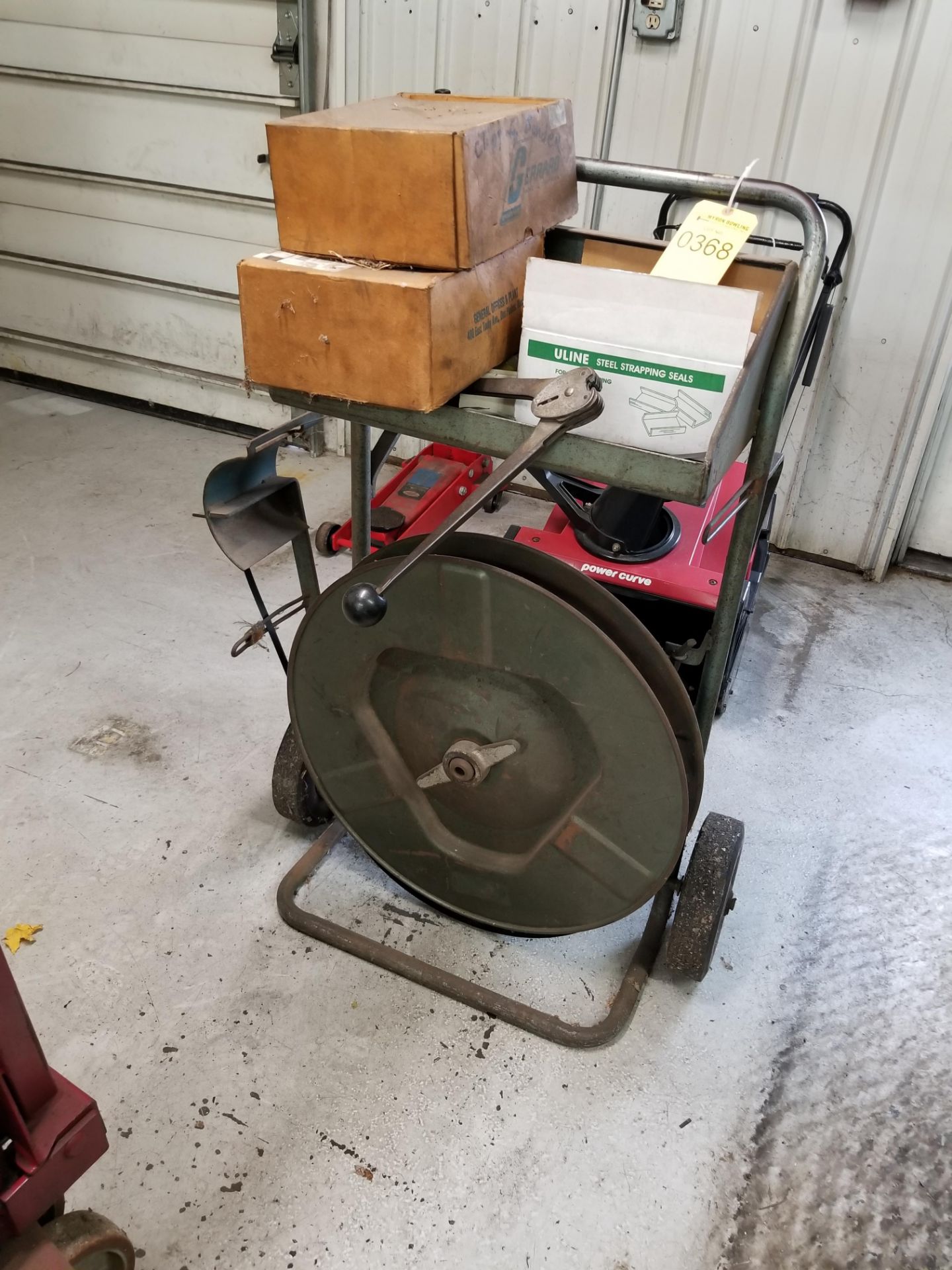 LOT: STEEL BANDING UNIT WITH BANDING TOOL, STEEL BANDING, AND CLIPS