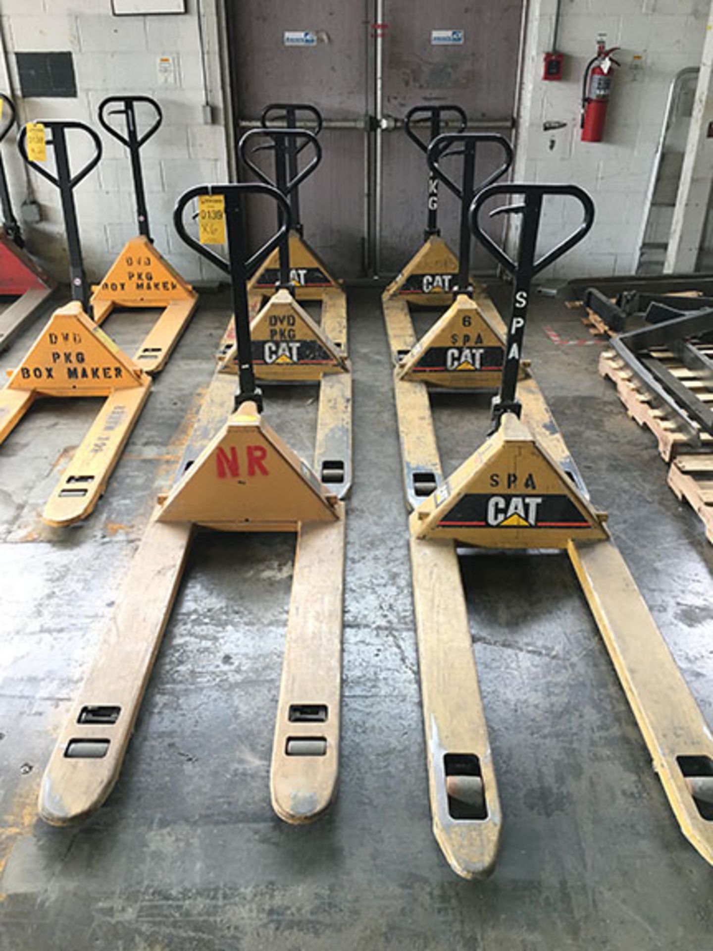 (6) CAT PALLET JACKS