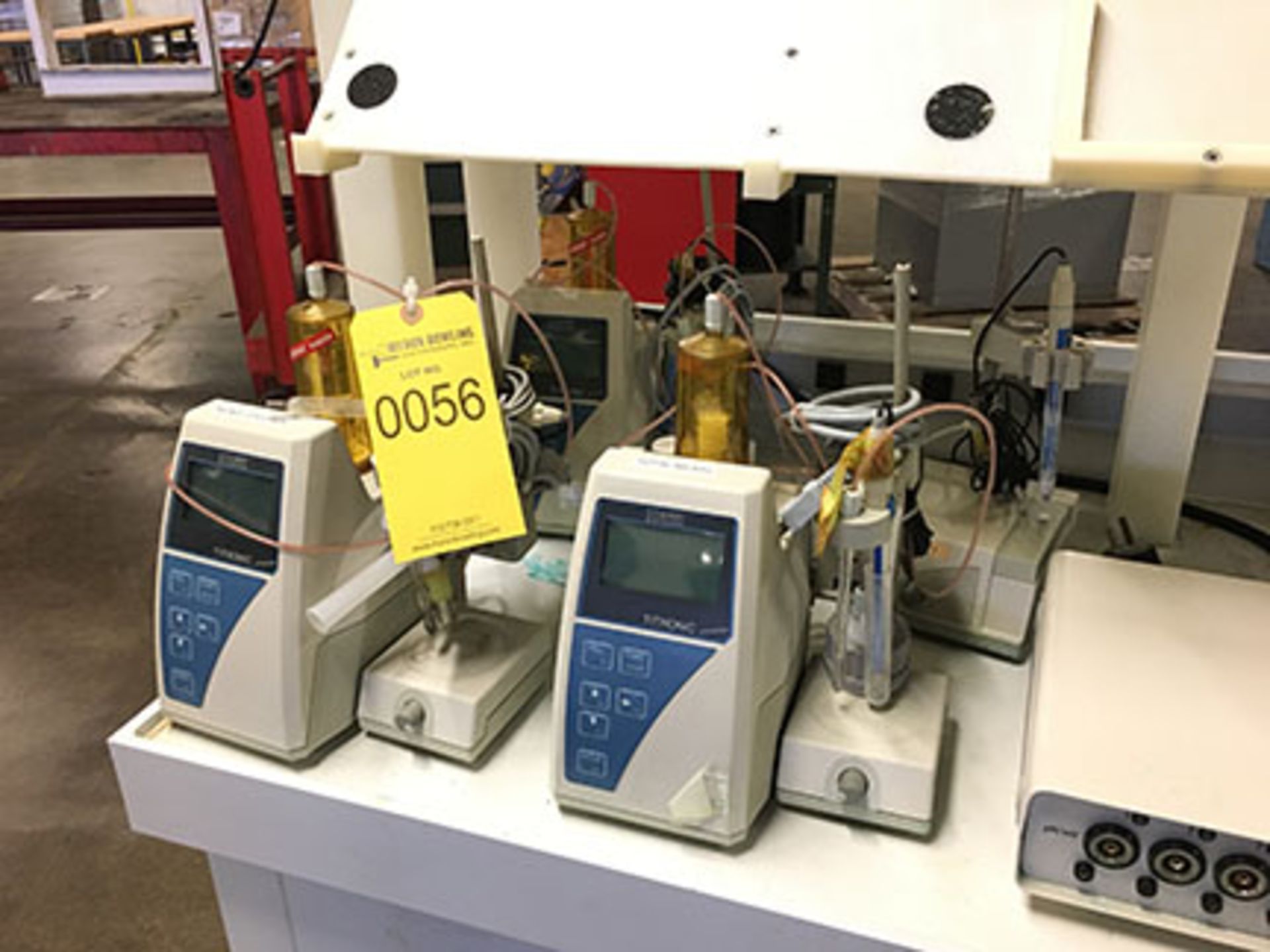 AUTOMATIC TITRATOR ON ROLLING DESK WITH (3) TITRONIC UNIVERSAL, WITH JENSEN SYSTEMS SENSOLAB PHS