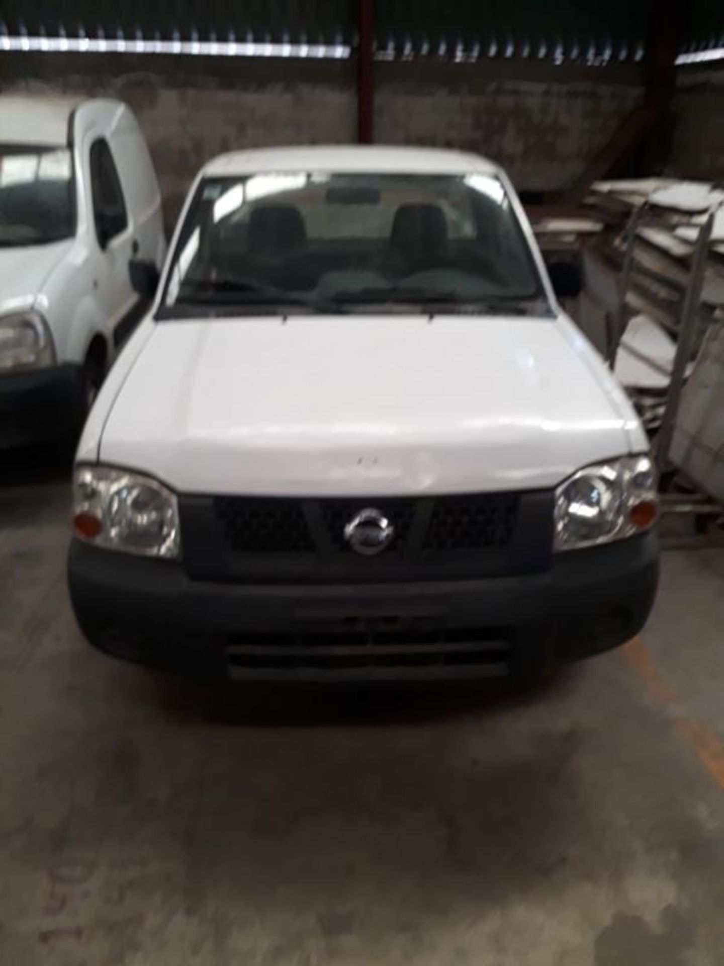 Vehículo Marca Nissan Tipo Pick Up T/M Dh Camioneta, Modelo 2009, 4 Cilindros, Located In: