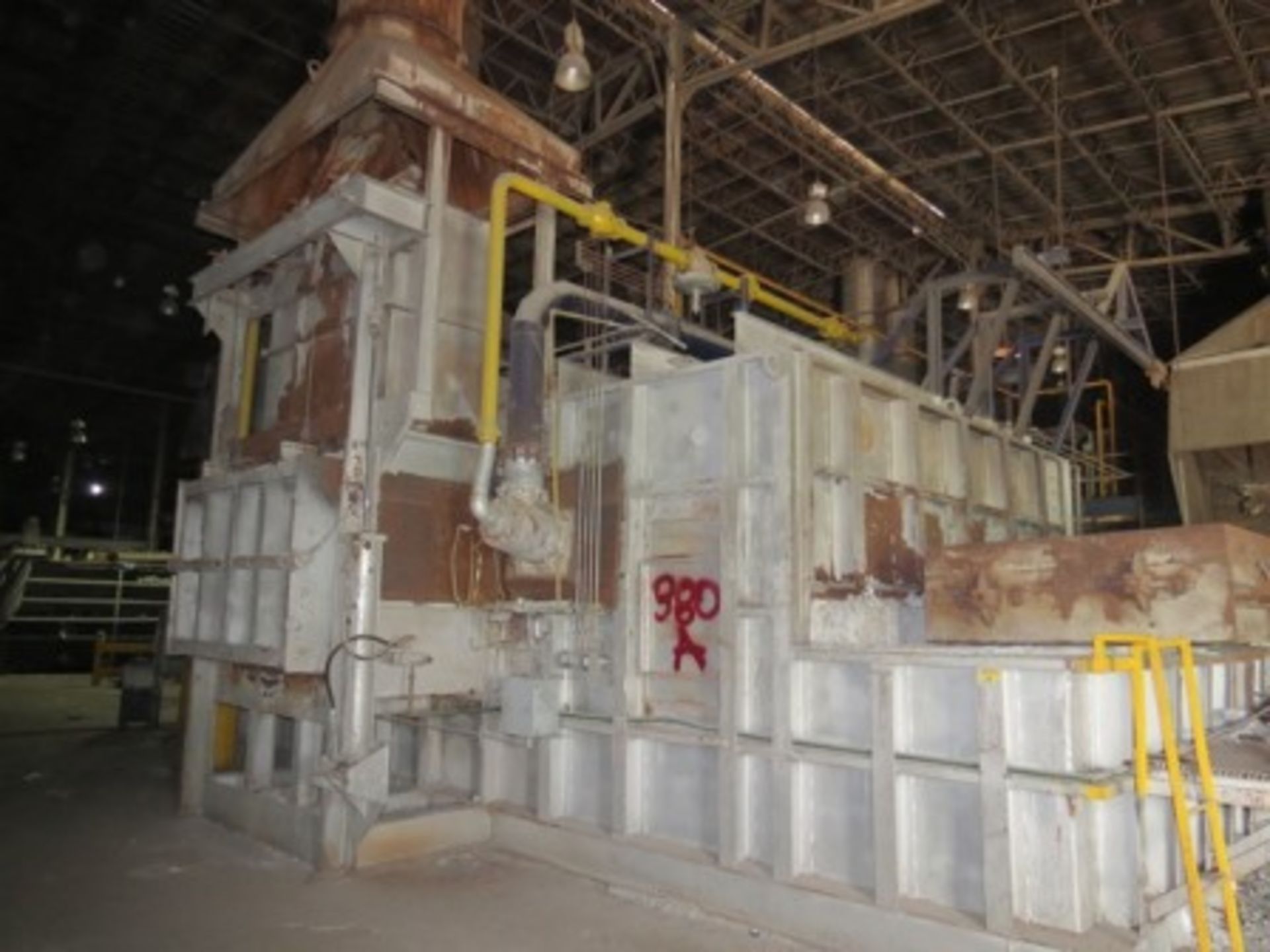 Melting furnace with dumper, hood and ductwork for gas extraction.