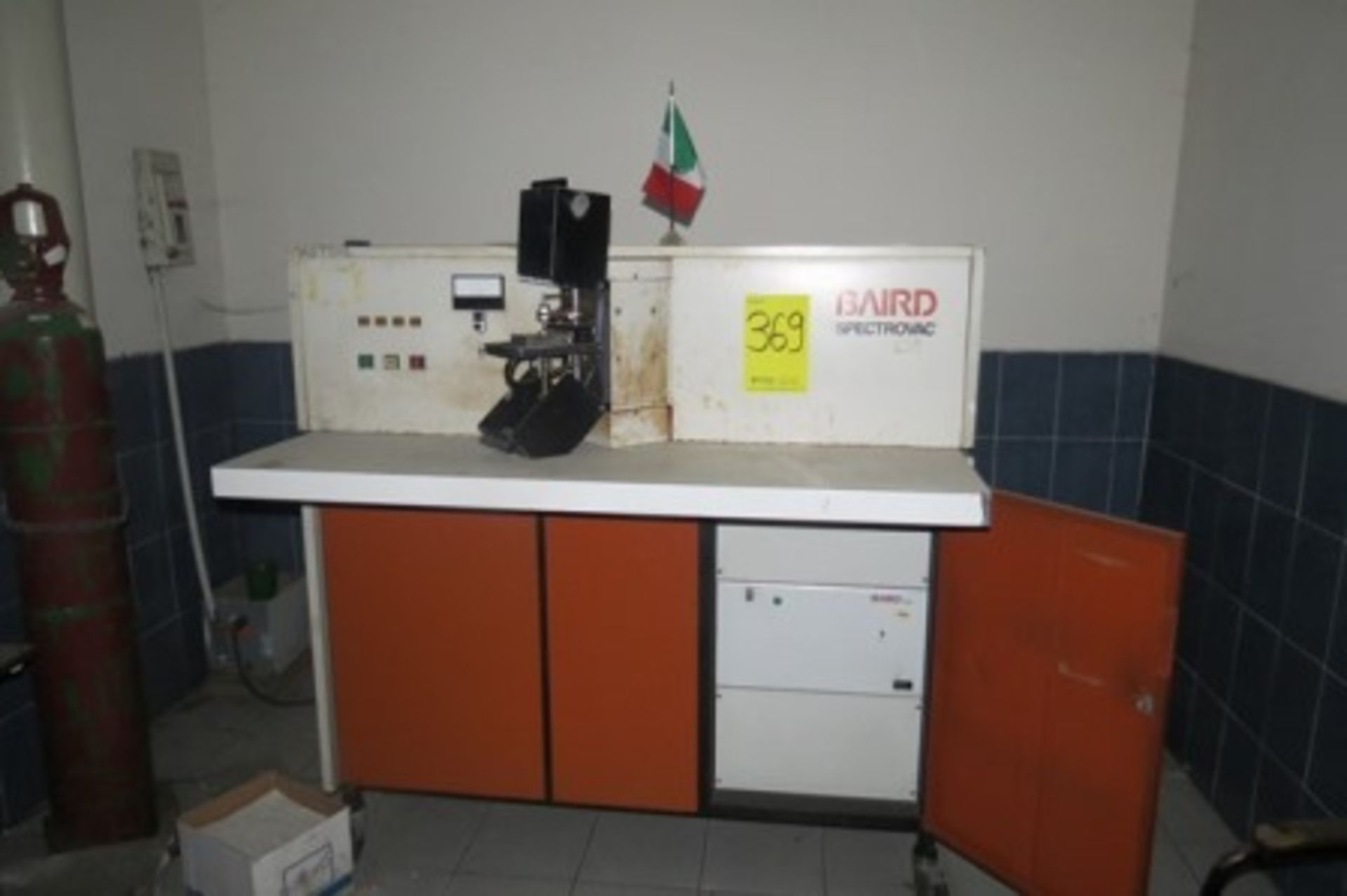 Baird spectrophotometer, laboratory furniture, test tube cabinet, bookcase and desk.